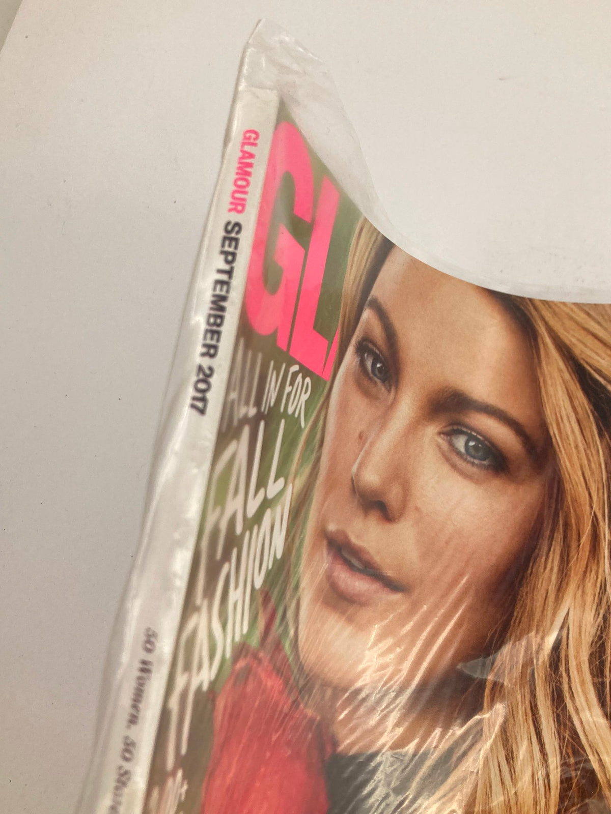 Close-up view of Glamour Magazine September 2017 featuring Blake Lively on the cover, showcasing her beauty and style. This vintage magazine is sealed, emphasizing its collector's value.