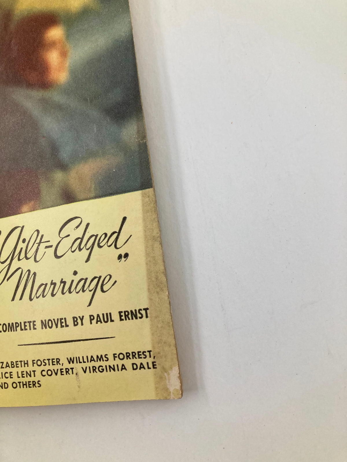 Close-up of the tab on the VTG Redbook Magazine April 1948 Vol 90 #6, highlighting the story 'Gilt-Edged Marriage' and contributors.