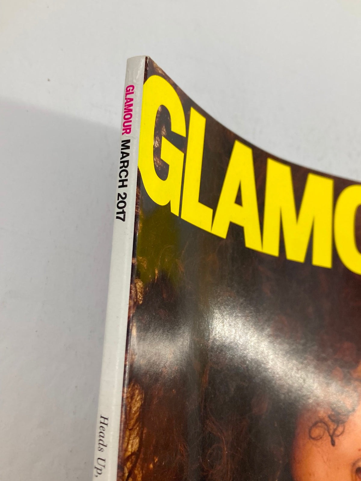 Spine view of Glamour Magazine March 2017, displaying the magazine title and publication date, capturing the essence of the edition featuring Alicia Keys.