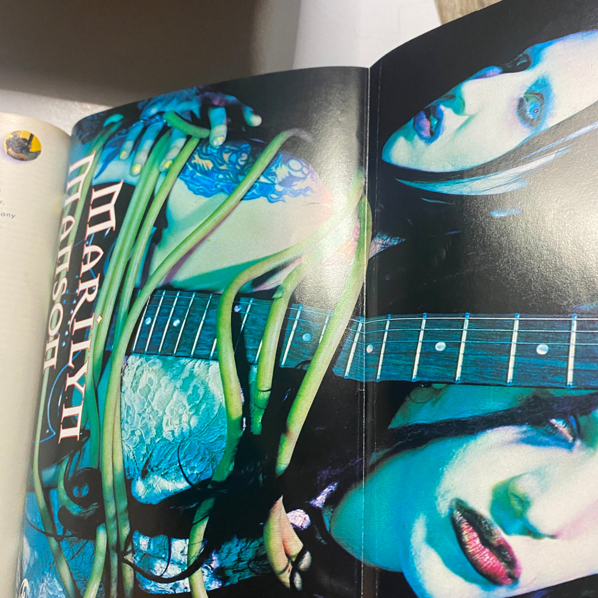 Inside pages of Guitar World Magazine June 1998 featuring an article on Marilyn Manson and his unique guitar style.