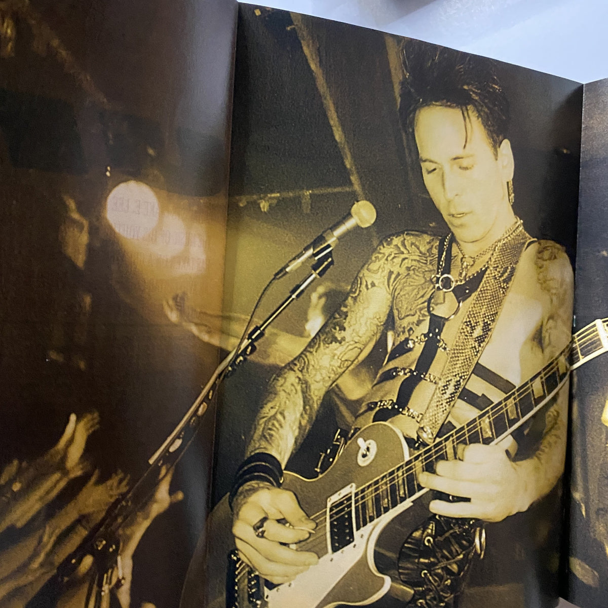 Guitar for the Practicing Musician Magazine July 1992, featuring a black and white photo of a tattooed guitarist performing live, capturing the essence of the rock music culture of the 1980s. This magazine includes a poster of Randy Rhoads.
