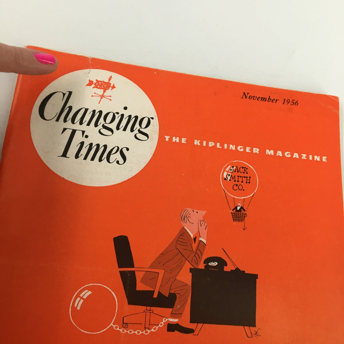 Detailed view of the cover of VTG Changing Times Magazine November 1956 highlighting the title 'Changing Times' and a colorful illustration of a businessman considering his future.
