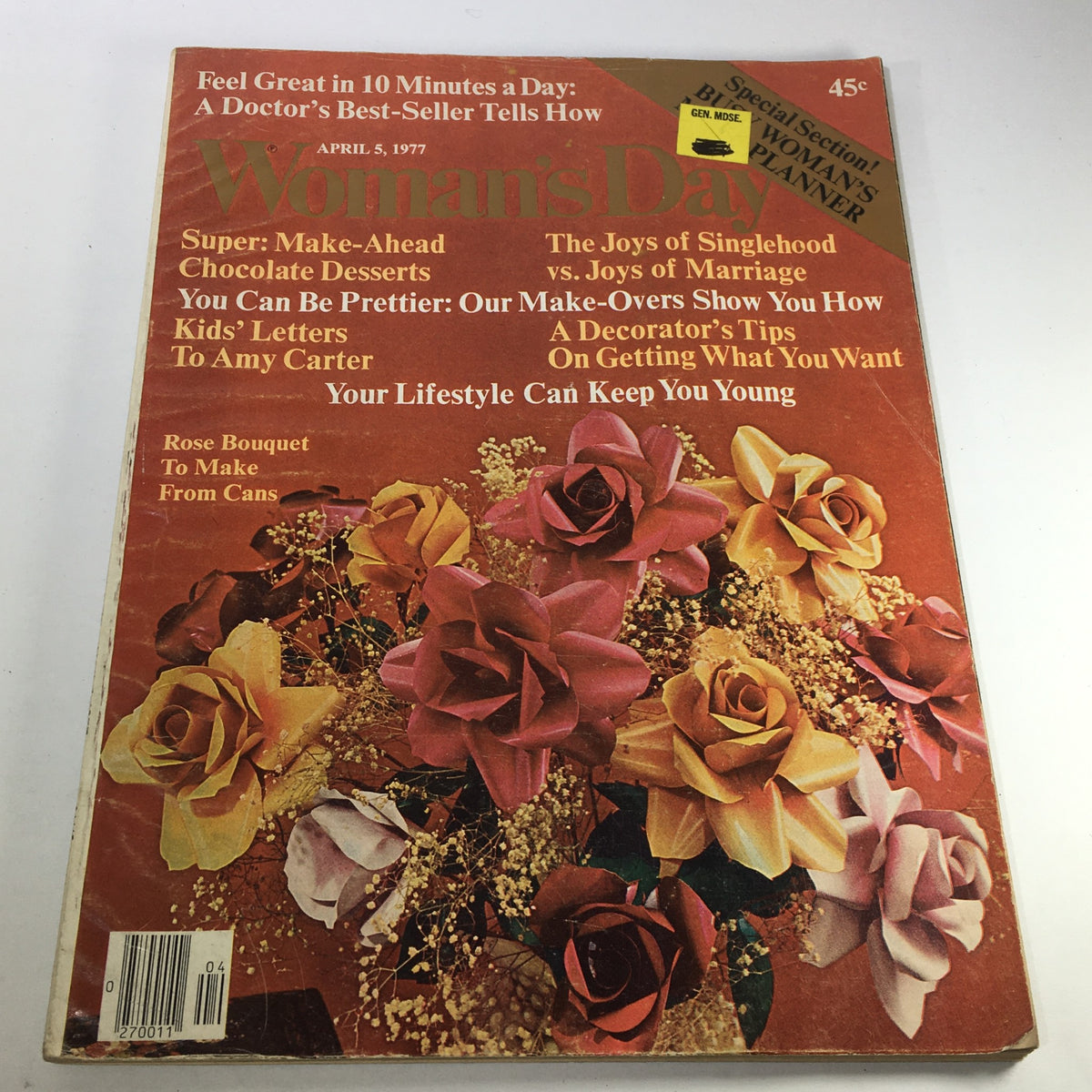 Cover of VTG Woman's Day Magazine from April 5, 1977, featuring a vibrant arrangement of roses and the headline 'Rose Bouquet To Make From Cans'. The magazine includes sections on lifestyle tips, desserts, and beauty suggestions.