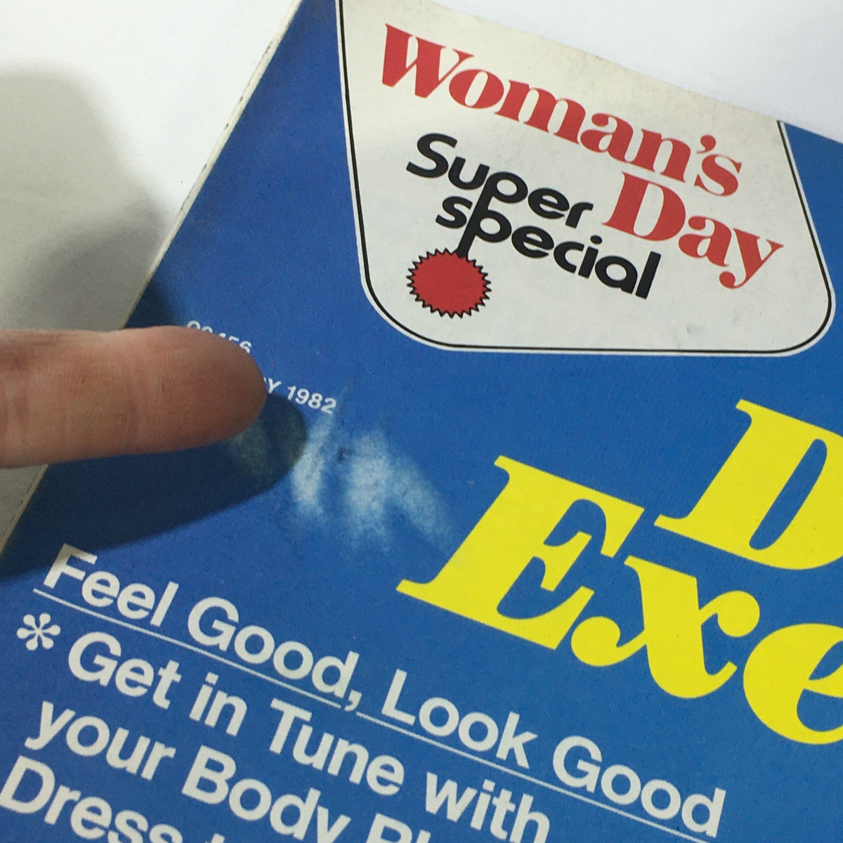 Close-up of Vintage Woman's Day Magazine January 1982 title section. The cover displays the magazine's logo and publication date, emphasizing the theme of Diet and Exercise.