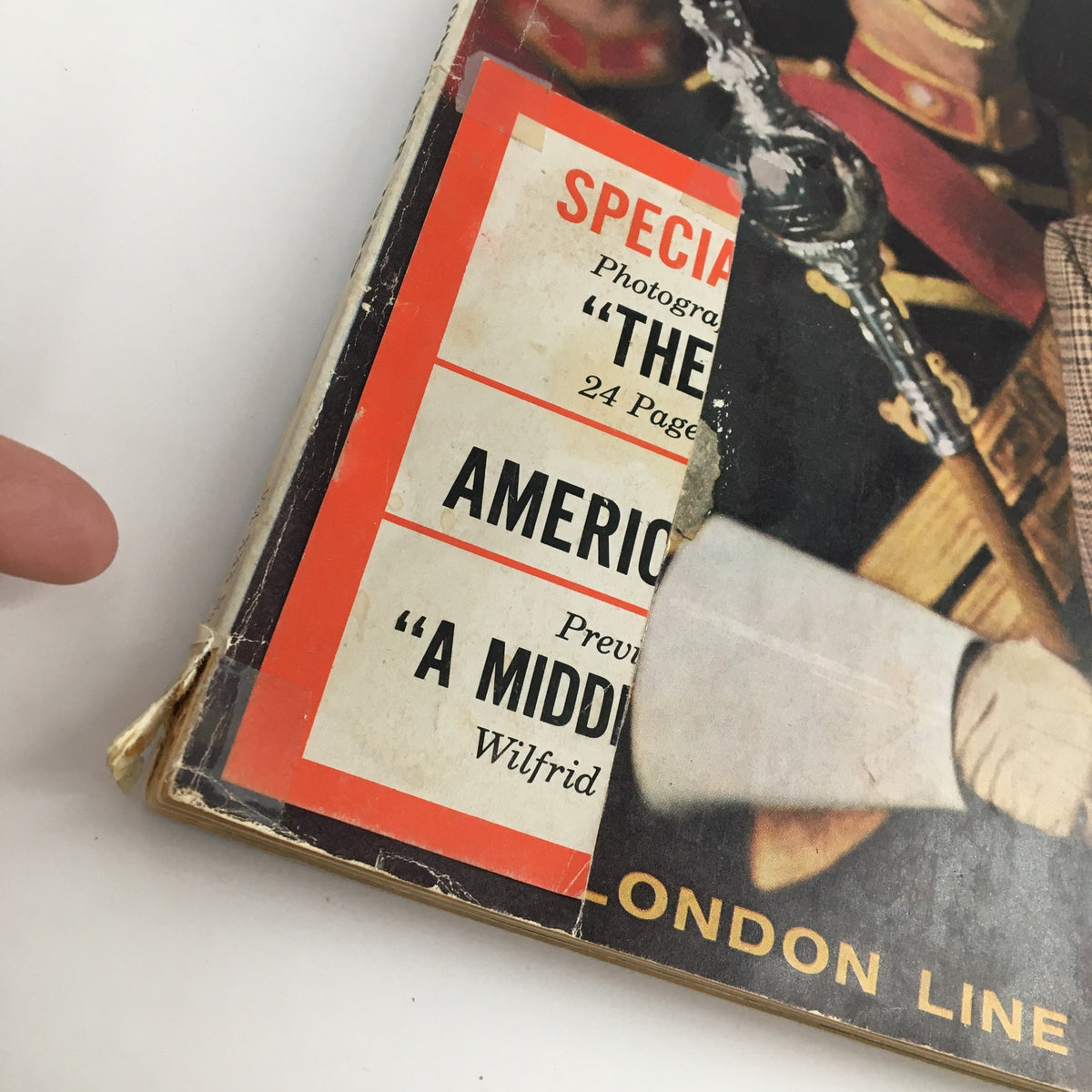 Close-up of the GQ Magazine October 1960 cover showing the special features section including 'The London Line', 'America' and 'A Middle'.