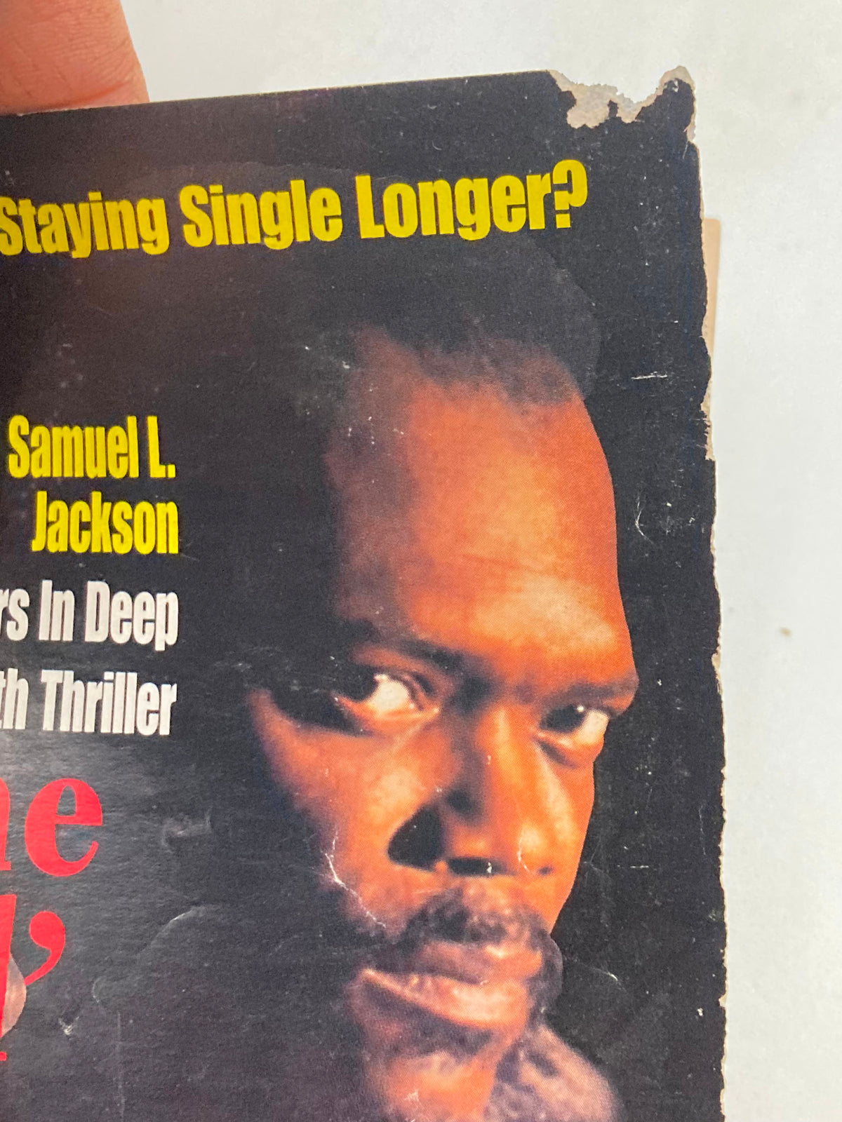 Close-up of the Jet Magazine cover from July 29, 1996, highlighting Samuel L. Jackson's face. The cover includes the title 'Jet' and details from the article about 'A Time To Kill,' showcasing wear and tear.