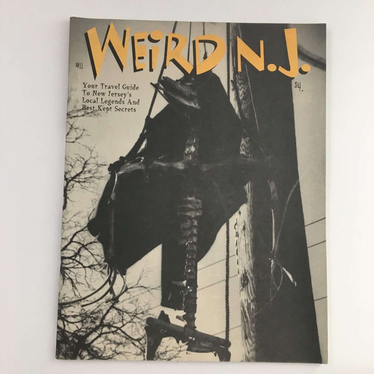Cover of Weird N.J. Magazine 1999 #11 showcasing a photographic depiction of local legends and folklore from New Jersey, emphasizing its title and vintage appeal.