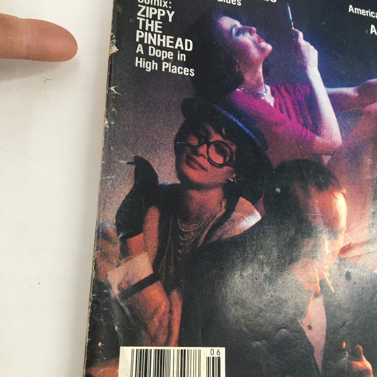 Close-up of the High Times Magazine June 1979 cover highlighting the article 'Zippy the Pinhead: A Dope in High Places' with details of wear, enhancing its vintage collectible appeal.