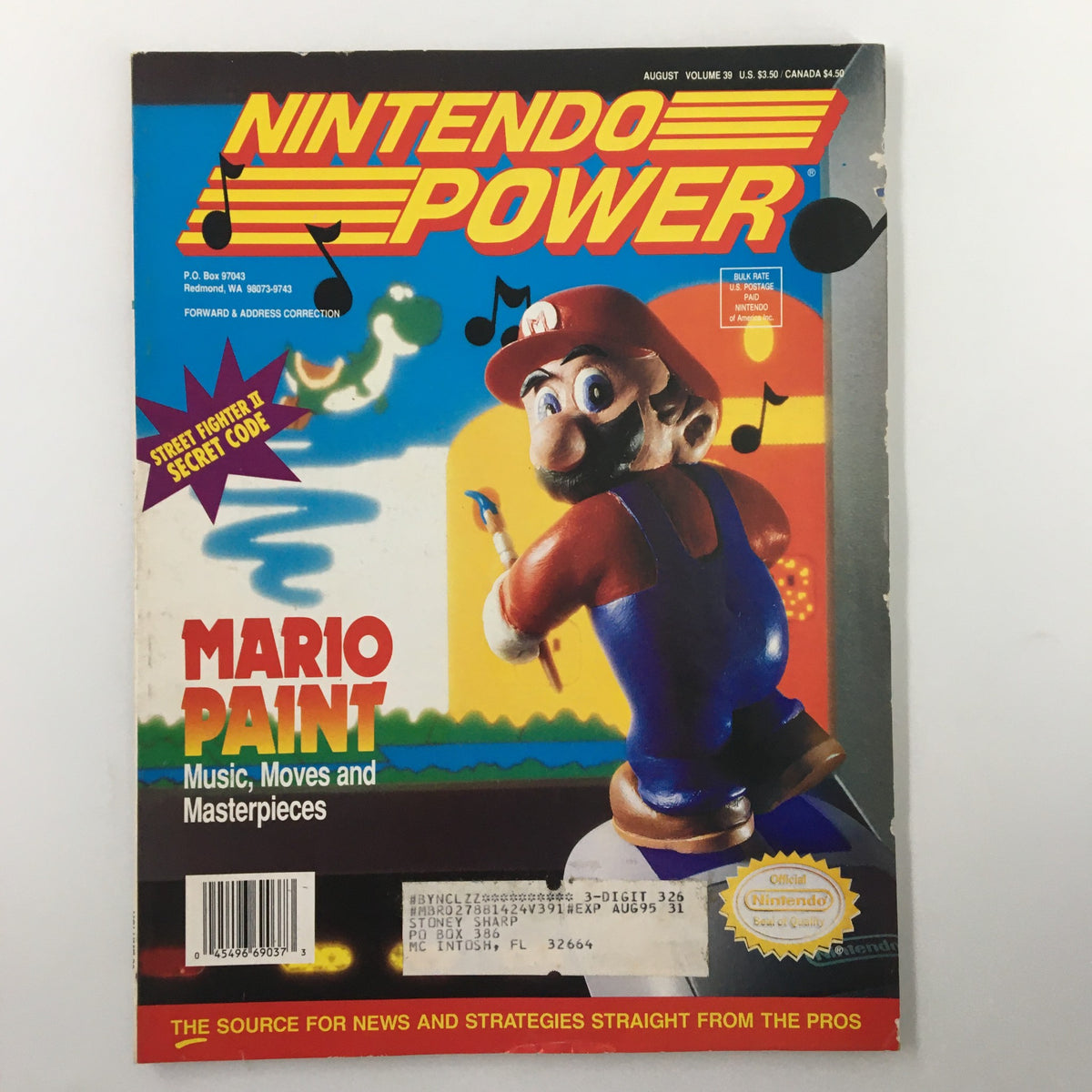 Cover of Nintendo Power Magazine August 1992, Issue #39, featuring Super Mario Paint, with vibrant artwork showcasing Mario and music notes.