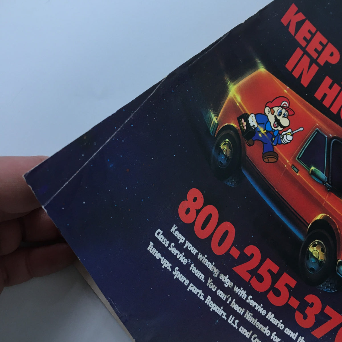 Nintendo Power Magazine August 1992 #39 displaying a back cover advertisement with Mario alongside a car, promoting Nintendo service and repair information.
