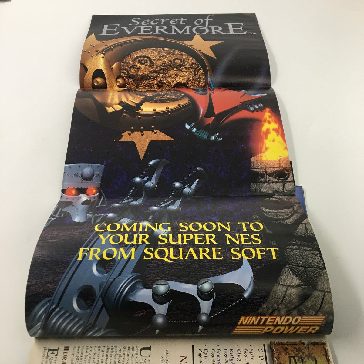 Fold-out poster advertisement from the Nintendo Power Magazine May 1995 #72 showcasing Secret of Evermore, emphasizing upcoming game releases for the Super NES.