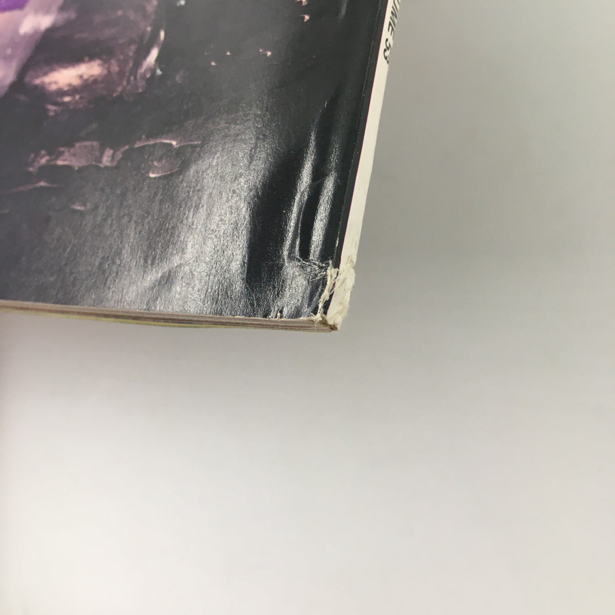 Corner damage on the cover of Nintendo Power Magazine October 1993 #53, showcasing minor wear typical for vintage collectibles.