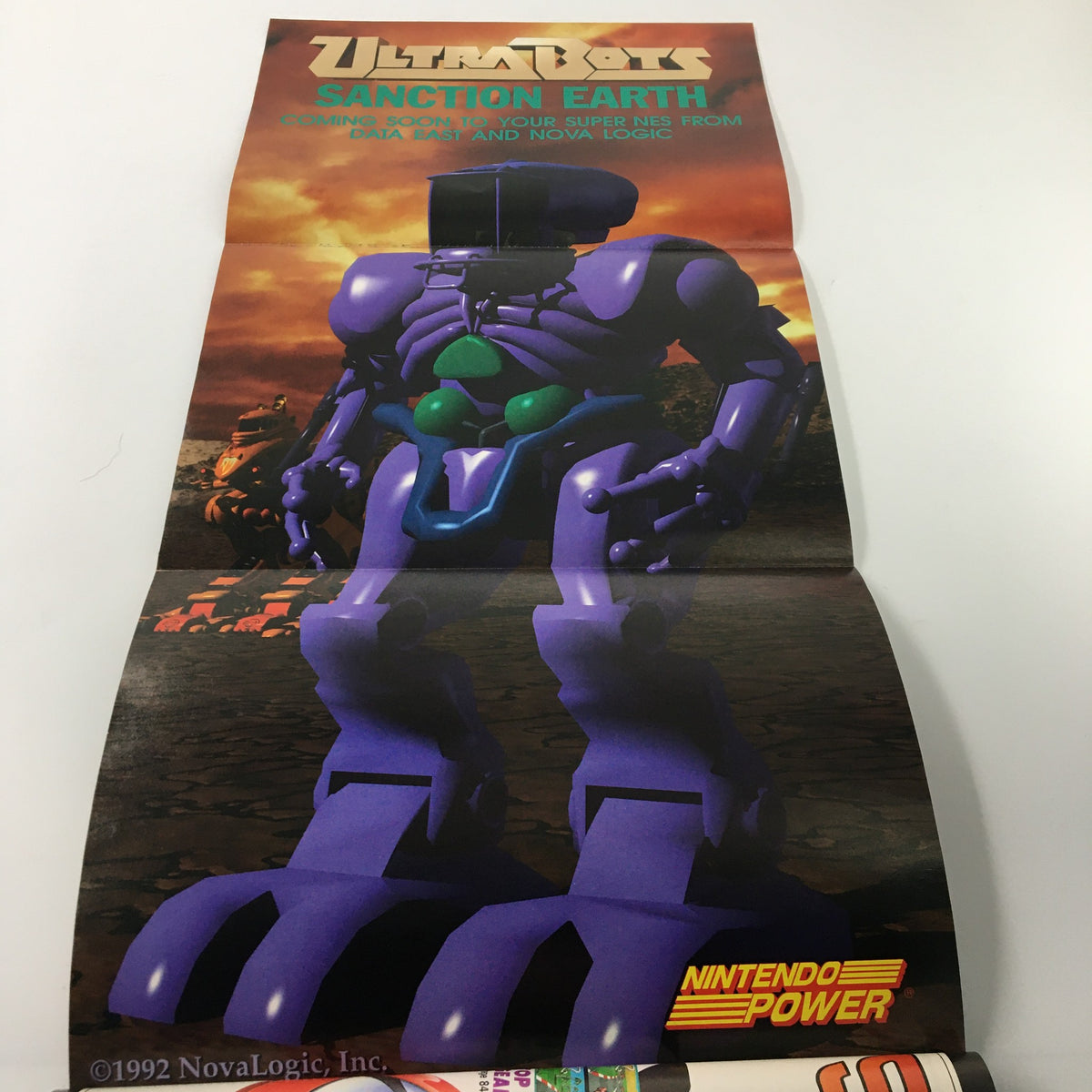 Fold-out poster from Nintendo Power Magazine June 1992 #37 featuring Ultrabot's Sanction Earth, promoted for the Super NES.