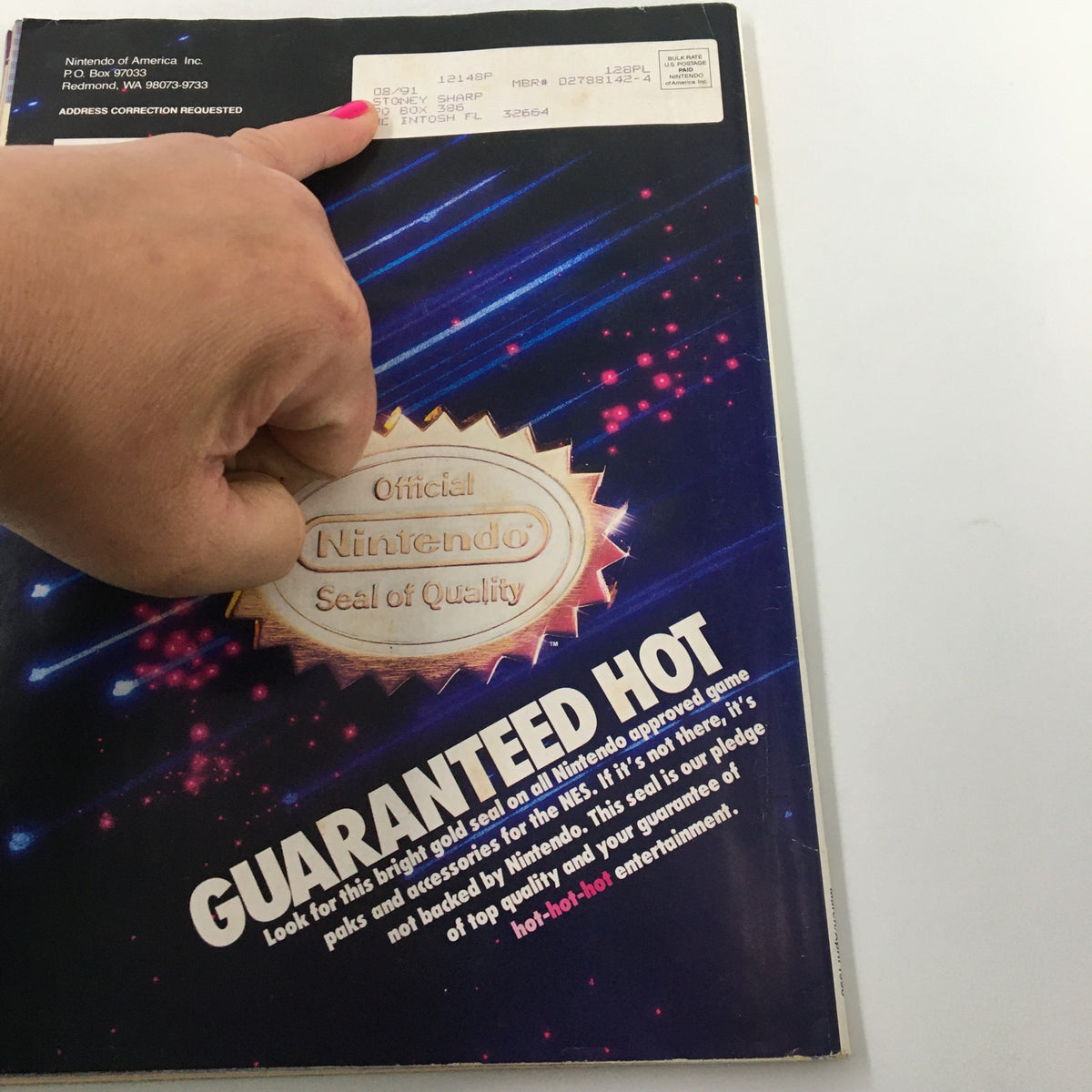 The back cover of Nintendo Power Magazine March 1990 featuring the Official Nintendo Seal of Quality, underscoring its reliability and nostalgic gaming.