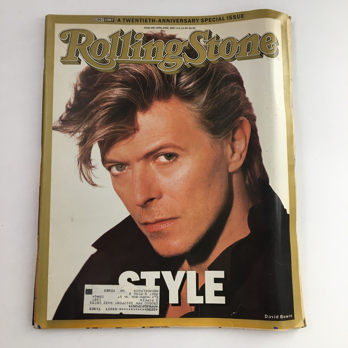 Cover of Rolling Stone Magazine, April 23, 1987, Issue 498 featuring David Bowie in a stylish pose, highlighting his iconic look from the 1980s.