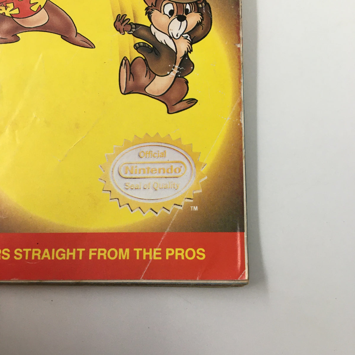 Back cover of Nintendo Power Magazine July 1990 featuring Disney's Chip 'N Dale Rescue Rangers characters, displaying the Official Nintendo Seal of Quality, highlighting its collectible value.