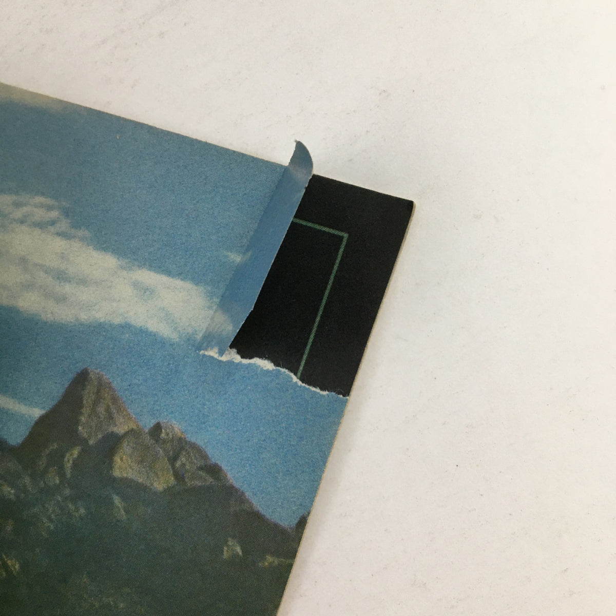 Close-up section of the spine of the Rolling Stone Magazine January 28 1988 showing wear and tear, reflecting its vintage condition.