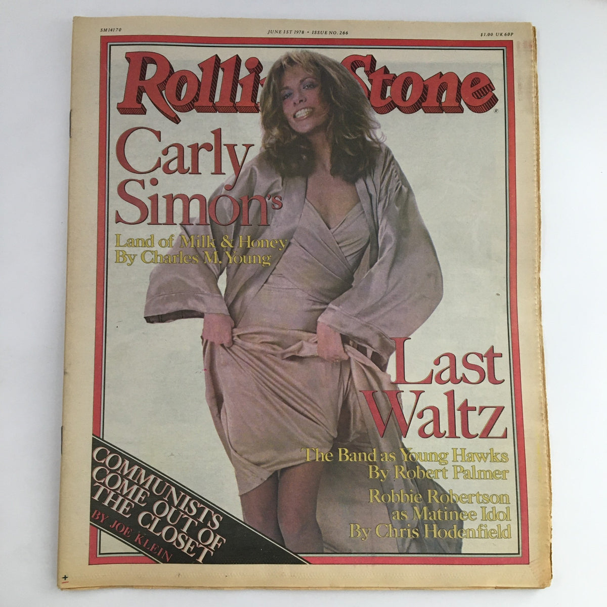 Cover of Rolling Stone Magazine dated June 1, 1978, featuring Carly Simon in a stylish dress. Highlights include articles on Carly Simon's work and Robbie Robertson, alongside cultural insights reflecting the music scene of the 1970s.