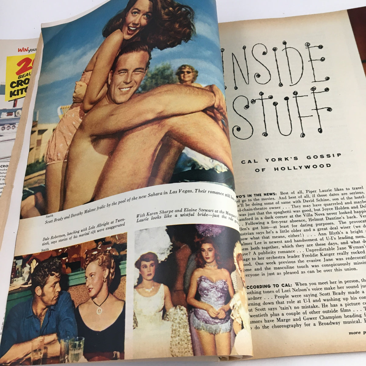 Gossip column titled 'Inside Stuff' with images of Hollywood celebrities including Scott Brady and Dorothy Malone, from the February 1953 edition of Photoplay Magazine.