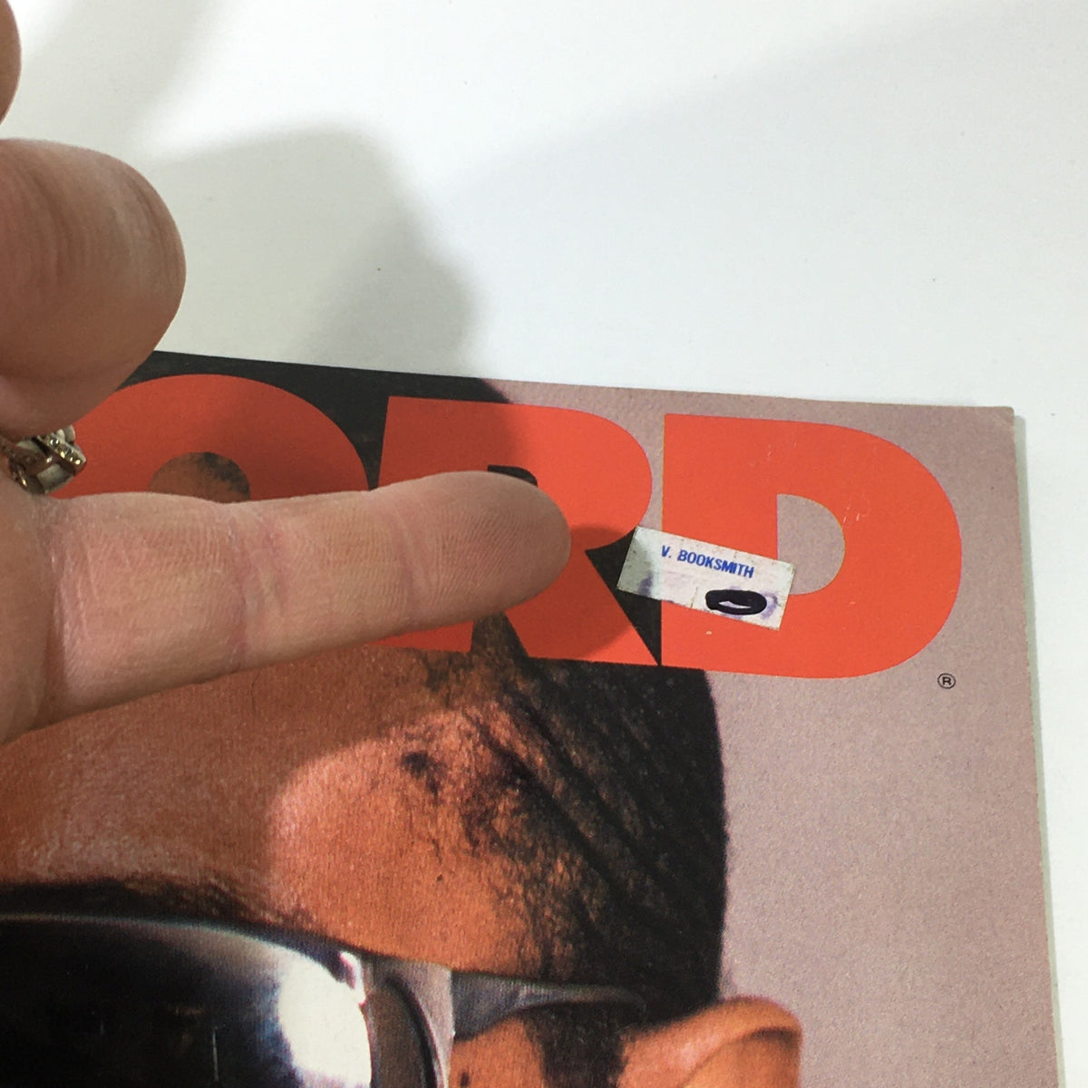 Close-up of the Vintage Record Magazine March 1984 cover highlighting a price sticker and the name 'V. Booksmith' on the magazine featuring Stevie Wonder.