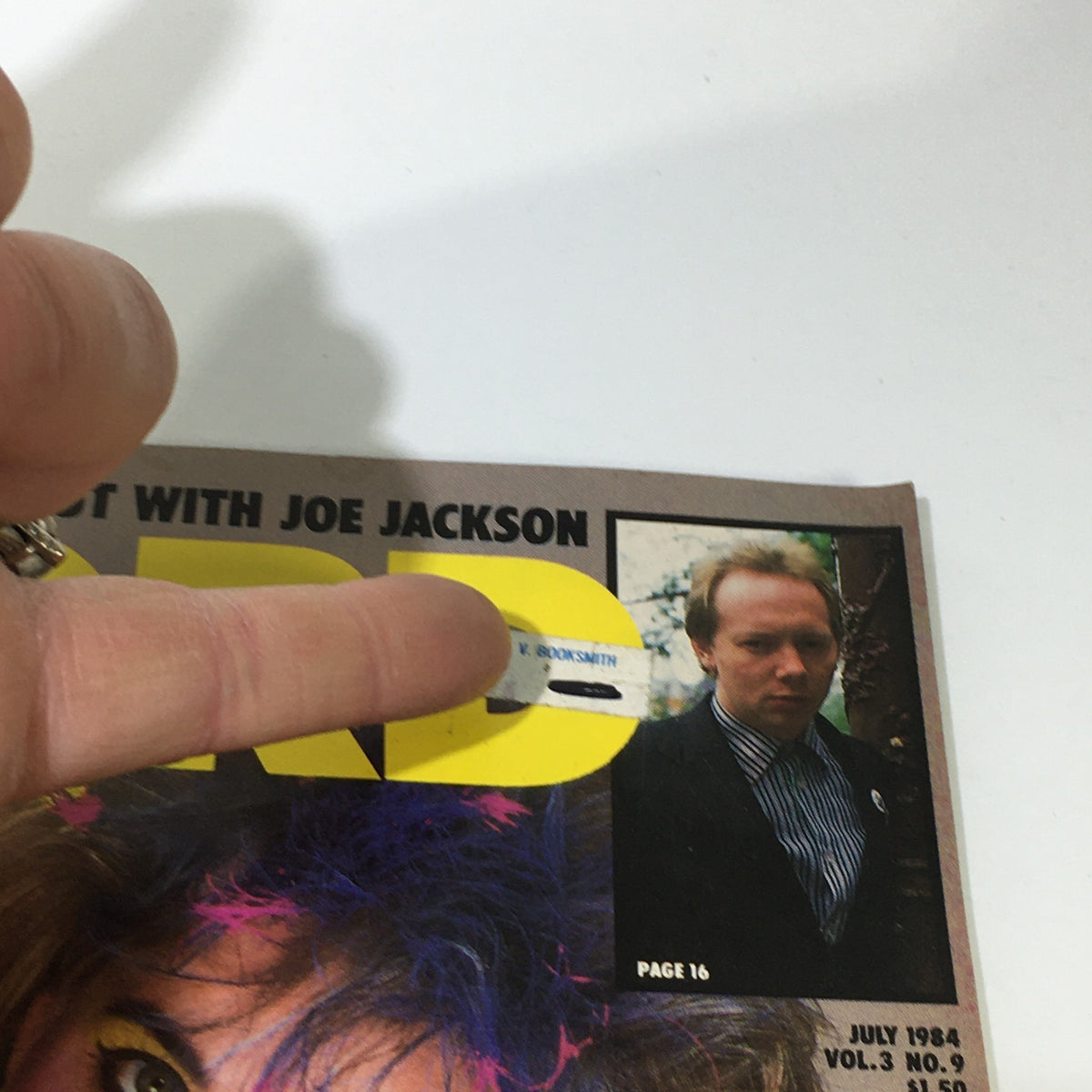 Close-up of the Vintage Record Magazine July 1984 cover, showing a focus on Joe Jackson with a price sticker and address label, exemplifying the magazine's vintage quality and collector's appeal.