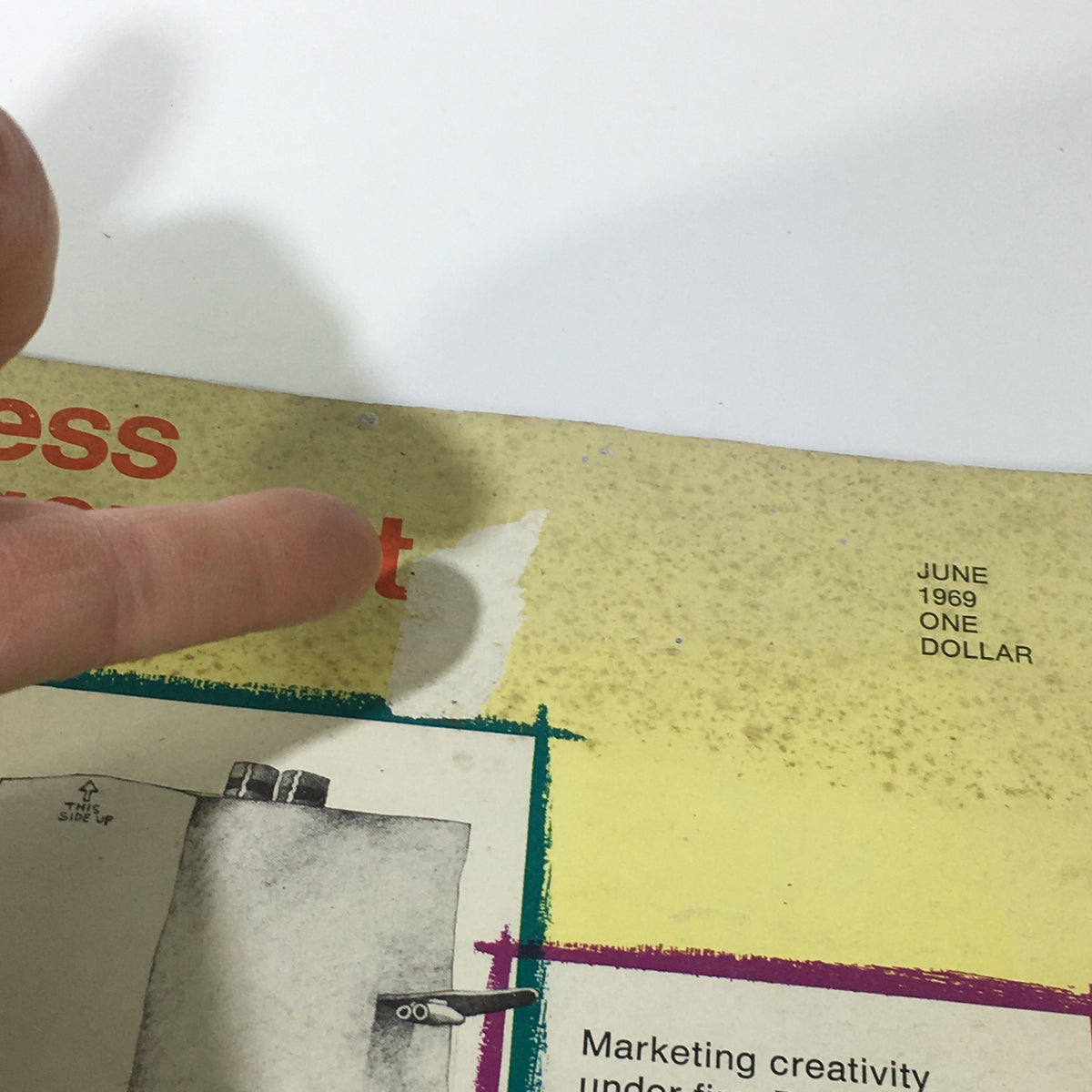 Close-up detail of the cover of VTG Business Management Magazine June 1969 showing a small tear and the magazine's date and price.