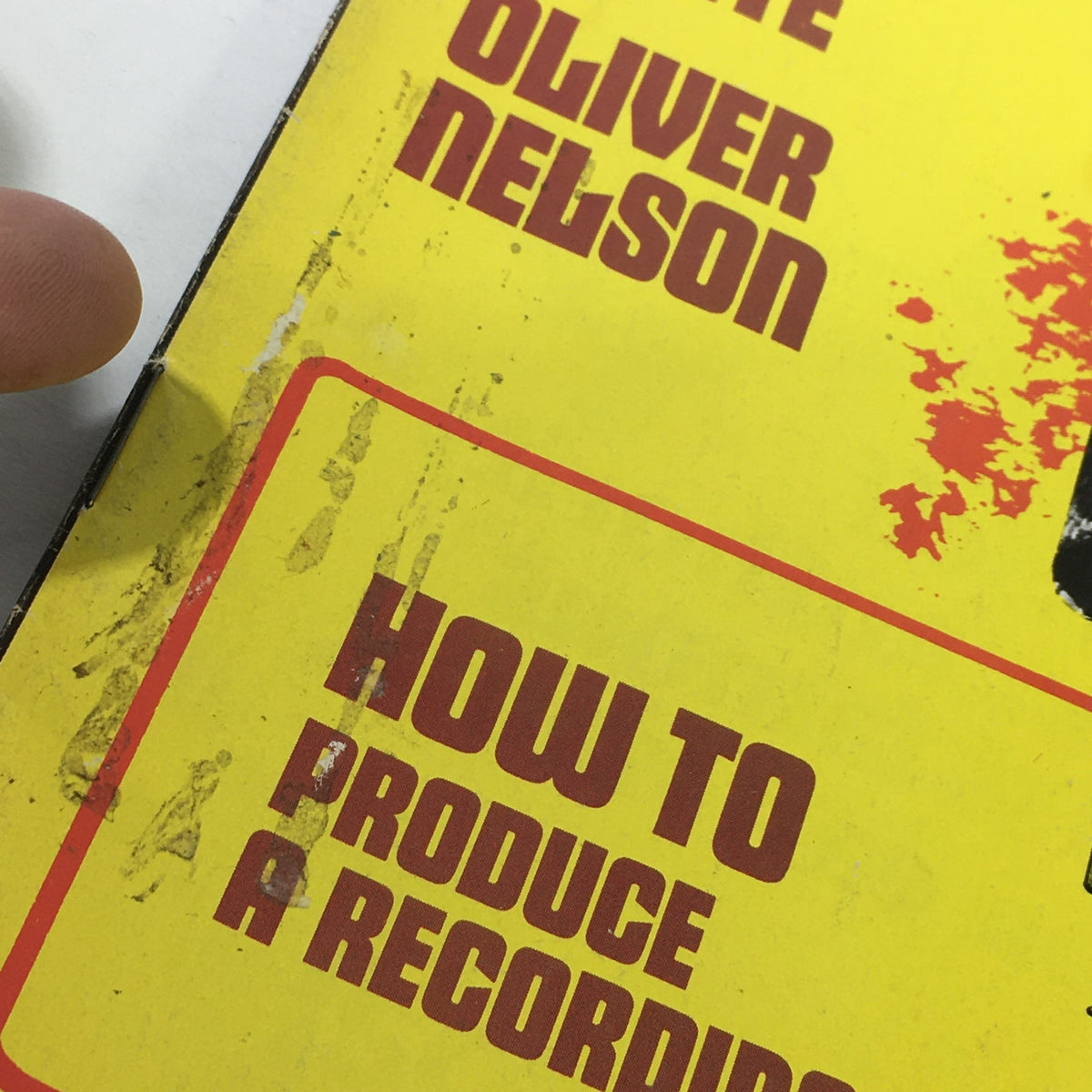 Detail of VTG Down Beat Magazine showing the text 'HOW TO PRODUCE A RECORDING...' and slight wear on the cover, dated April 24, 1975.