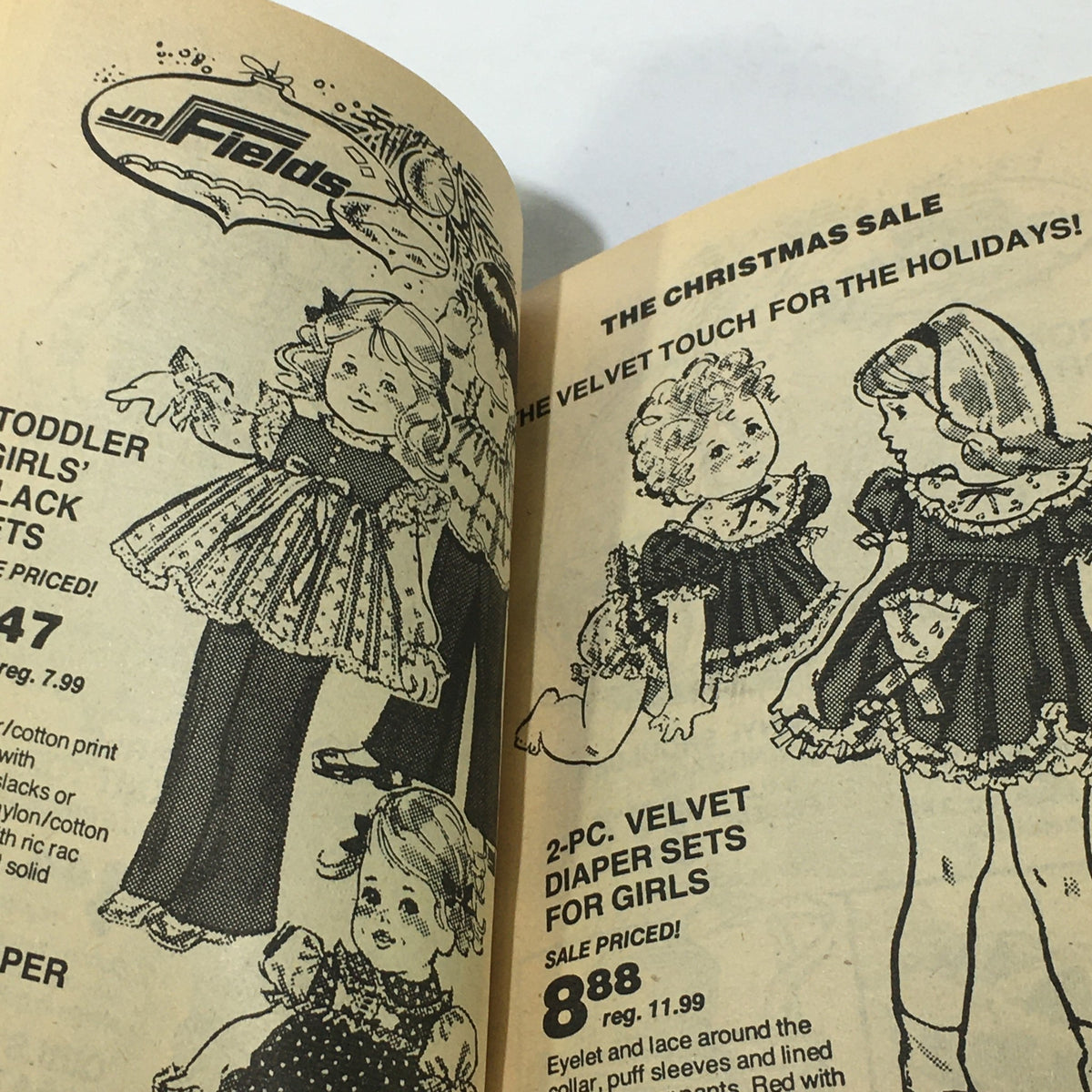 Children’s clothing advertisement from the VTG JM Fields The Christmas Sale Price Guide Catalog 1970s, featuring velvet sets for girls.
