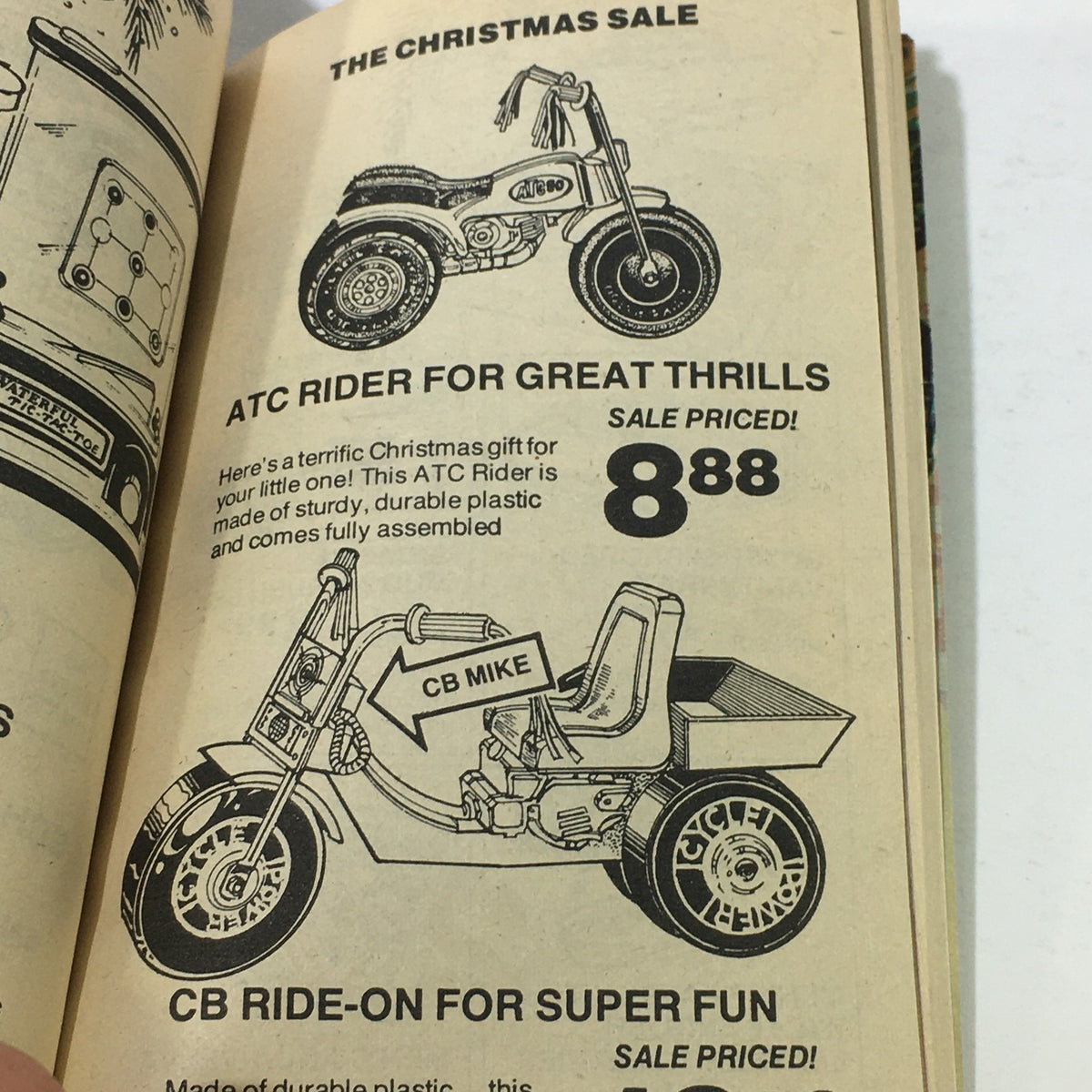 Vintage JM Fields The Christmas Sale Price Guide Catalog showcasing the ATC Rider toy for kids, priced at $8.88, highlighting 1970s holiday shopping.