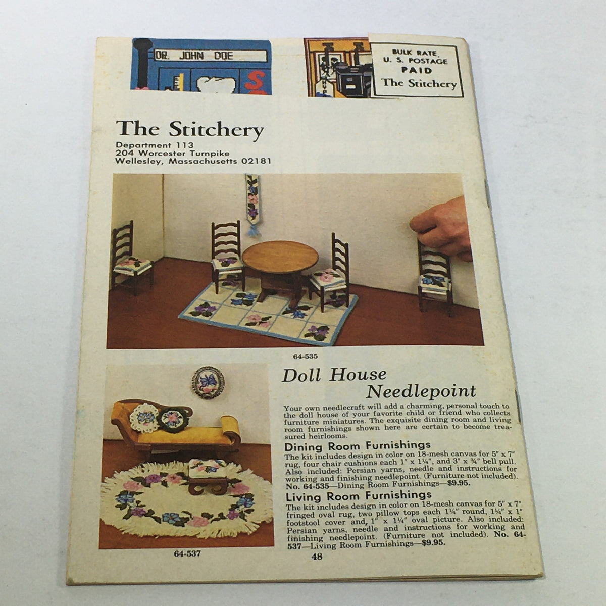 Back cover of VTG Rare The Stitchery 11th Year Price Guide Catalog featuring a cozy dollhouse scene and needlepoint designs, indicative of 1975 crafting trends.