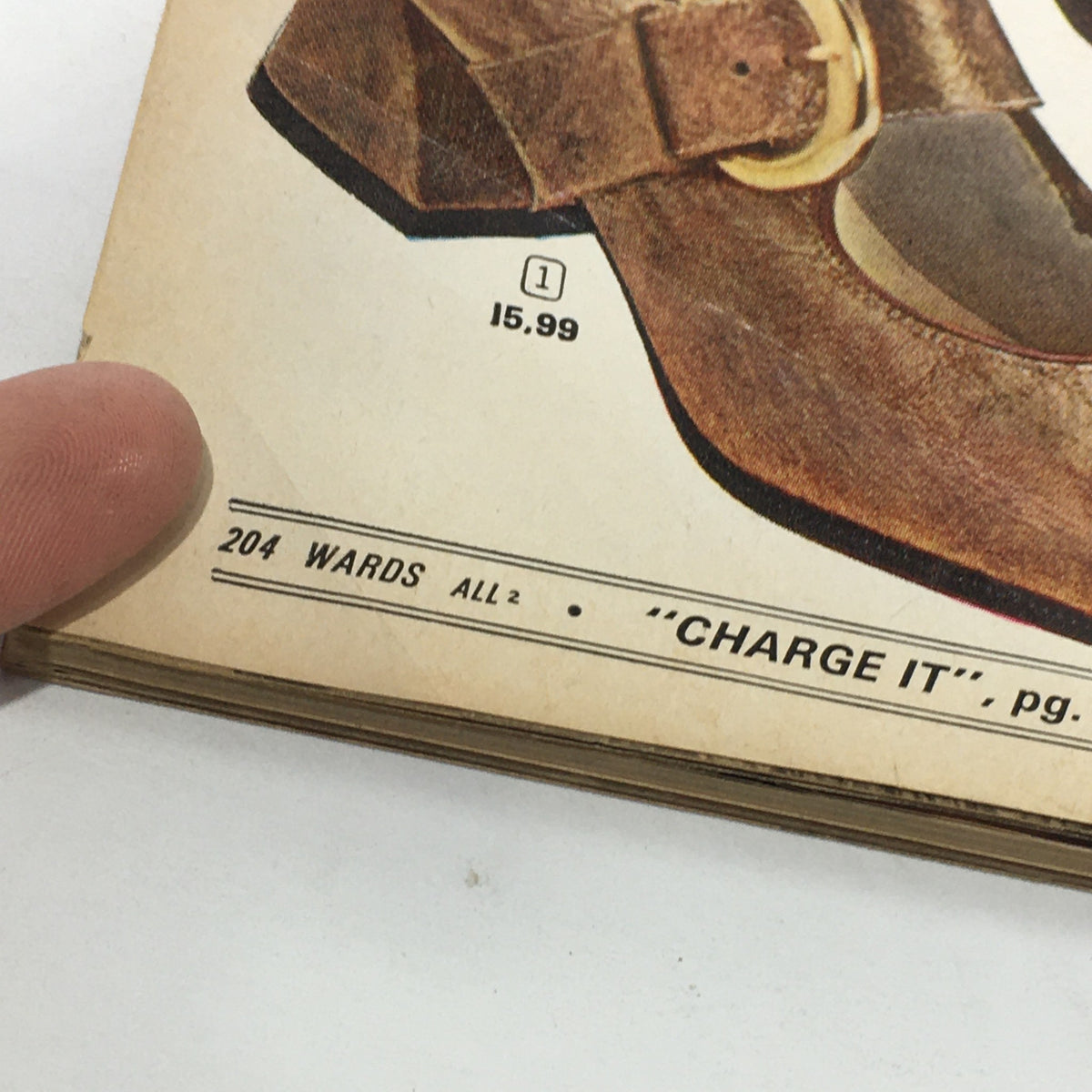 Close-up of a page from the Montgomery Ward Price Guide Catalog Fall-Winter 1970 featuring a brown shoe with a buckle, complete with pricing information.