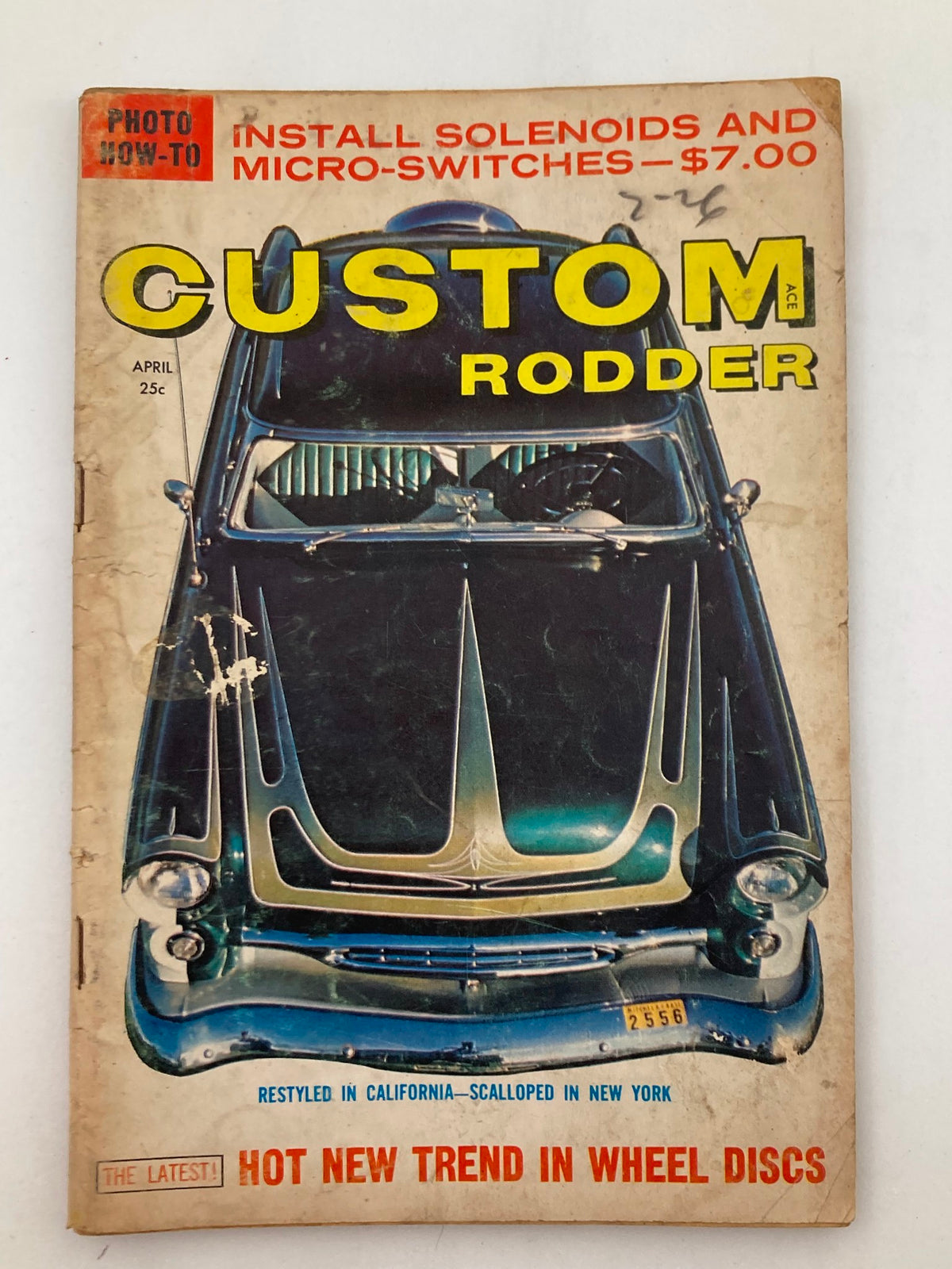 Cover of VTG Custom Rodder Magazine April 1959, Volume 4 Issue 4 featuring a classic car, highlighting the hot new trend in wheel discs. Describes vintage automotive culture with significant wear, showcasing its appeal to collectors.
