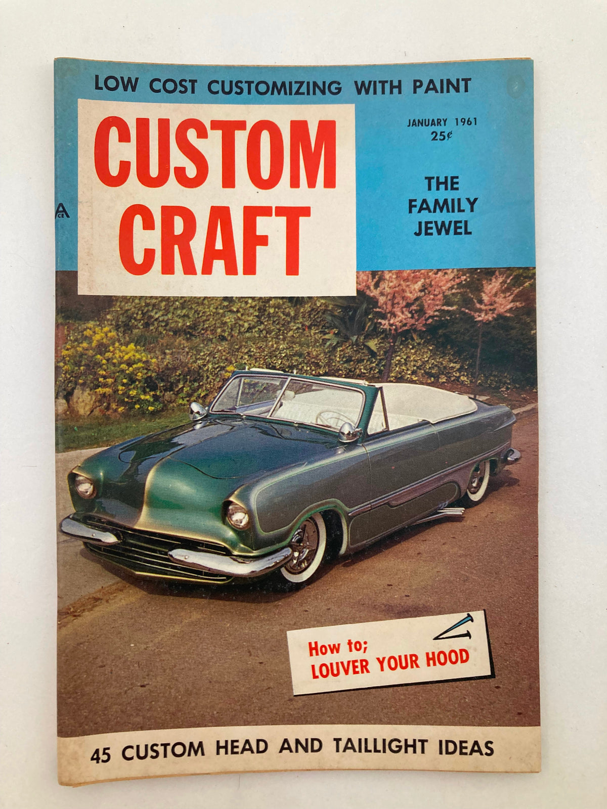 Cover of VTG Custom Craft Magazine January 1961 featuring a classic car with a louvered hood and bold title 'CUSTOM CRAFT'. Highlights include customization tips and vintage automotive culture.