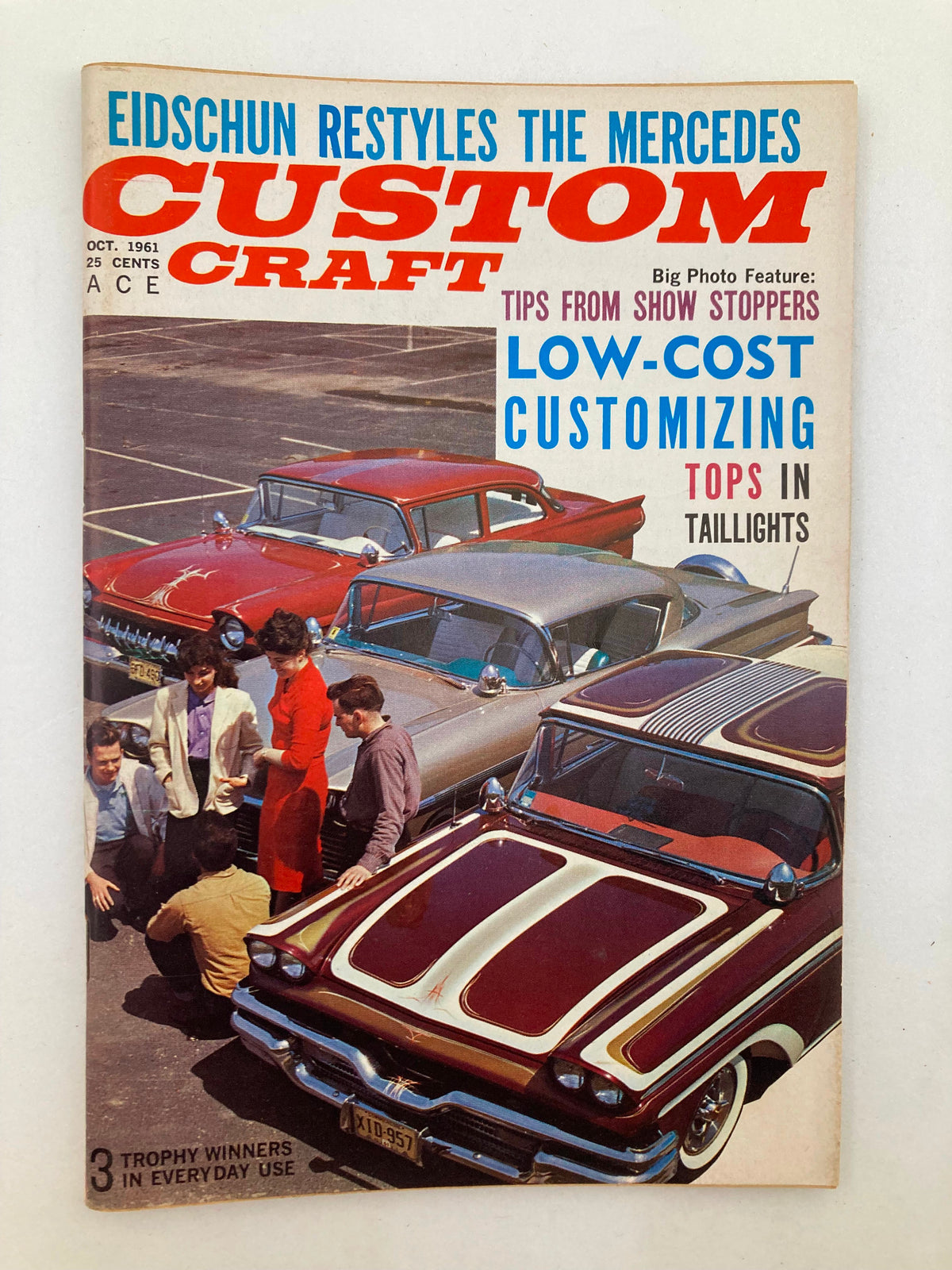 Cover of VTG Custom Craft Magazine October 1961, issue #10, featuring a vintage car scene with individuals discussing customization tips and showcasing low-cost ideas.