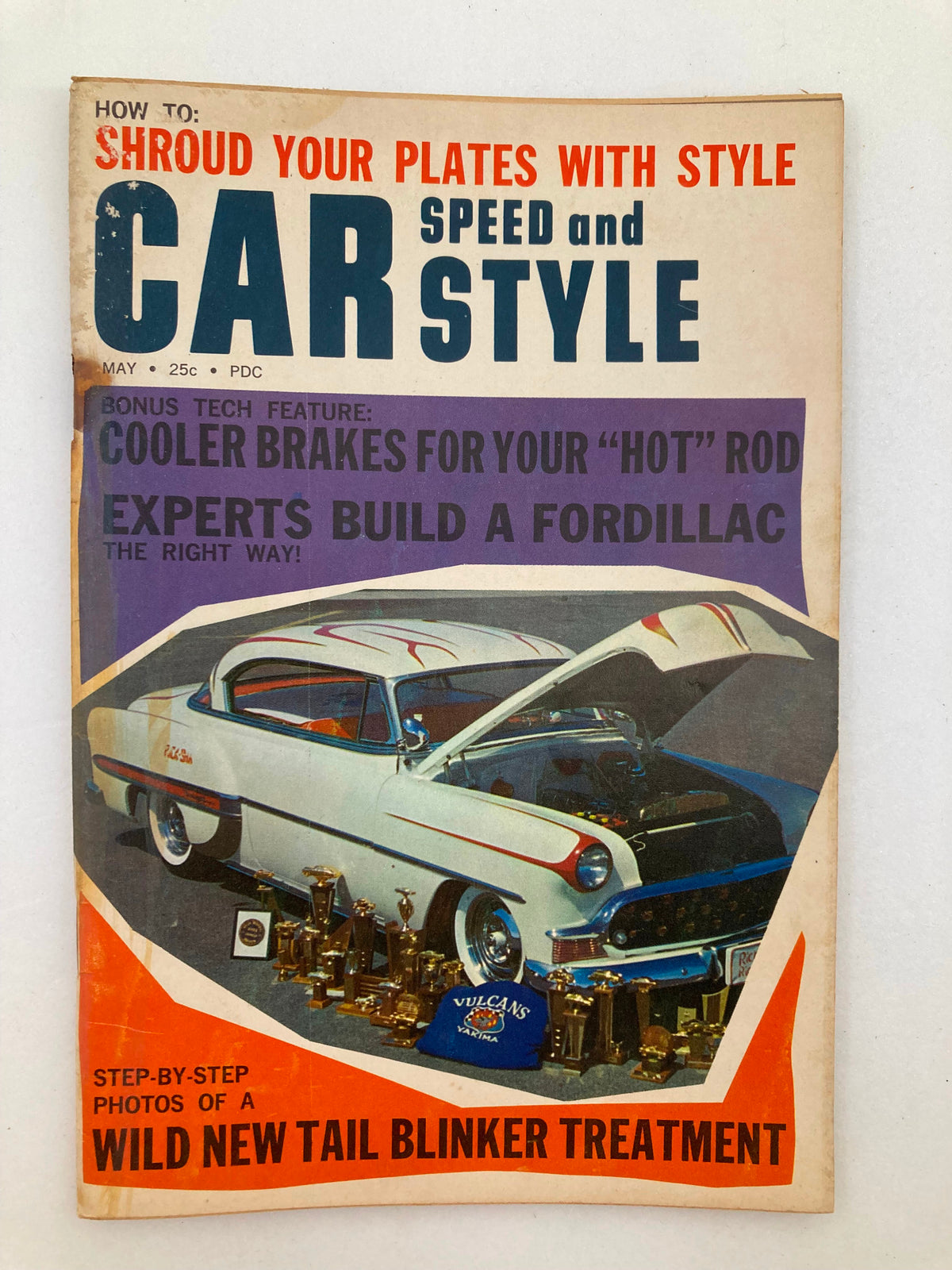 Cover of VTG Car Speed & Style Magazine May 1961 Vol 7 #5 featuring a vintage car showcasing a wild new tail blinker treatment, with a bold title and automotive trophies displayed.