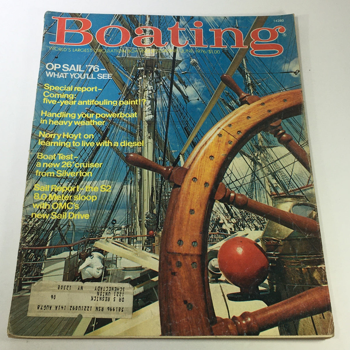 Vintage Boating Magazine cover from June 1976 showcasing OP Sail 76 event, featuring a wooden ship's wheel and nautical imagery, ideal for collectors and boating enthusiasts.