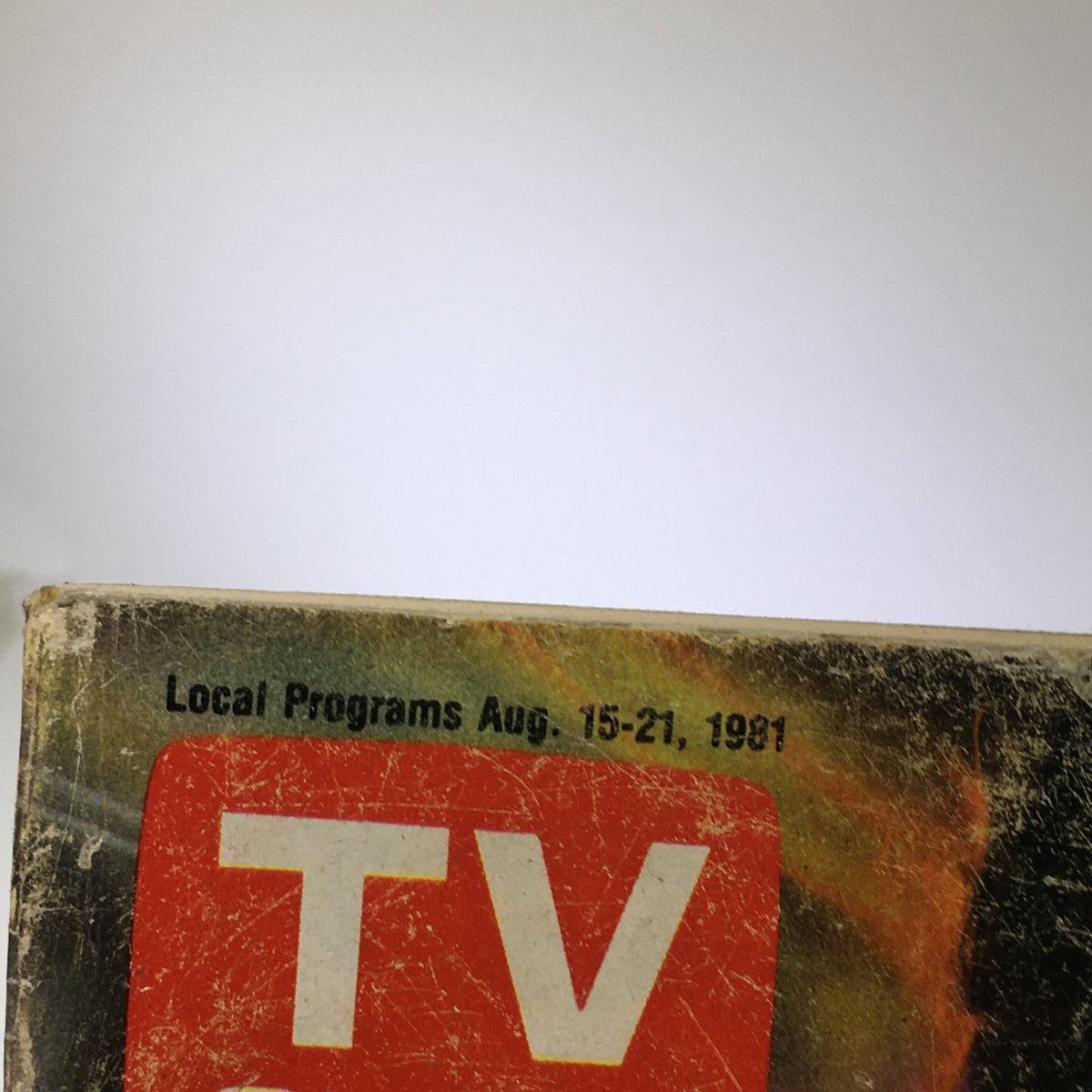 Top edge of the VTG TV Guide Local Programs August 15-21 1981, showcasing the vintage magazine's title and date while revealing some wear and tear reflective of its age.
