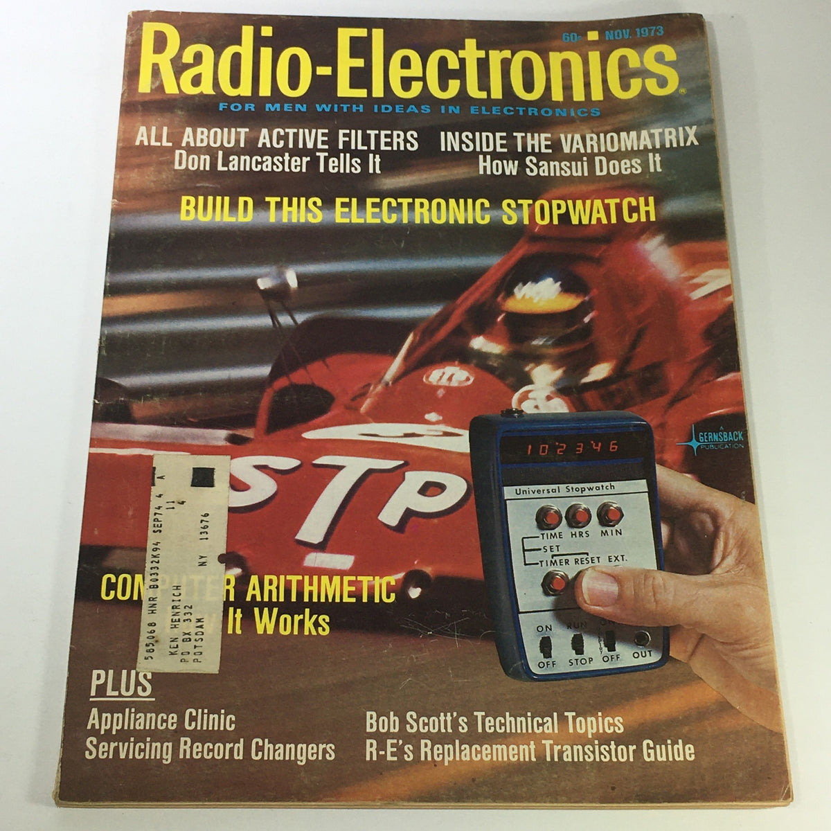 Cover of the VTG Radio-Electronics Guide Magazine for November 1973, featuring articles on Computer Arithmetic, active filters, and building an electronic stopwatch, showcasing vintage technology and design.