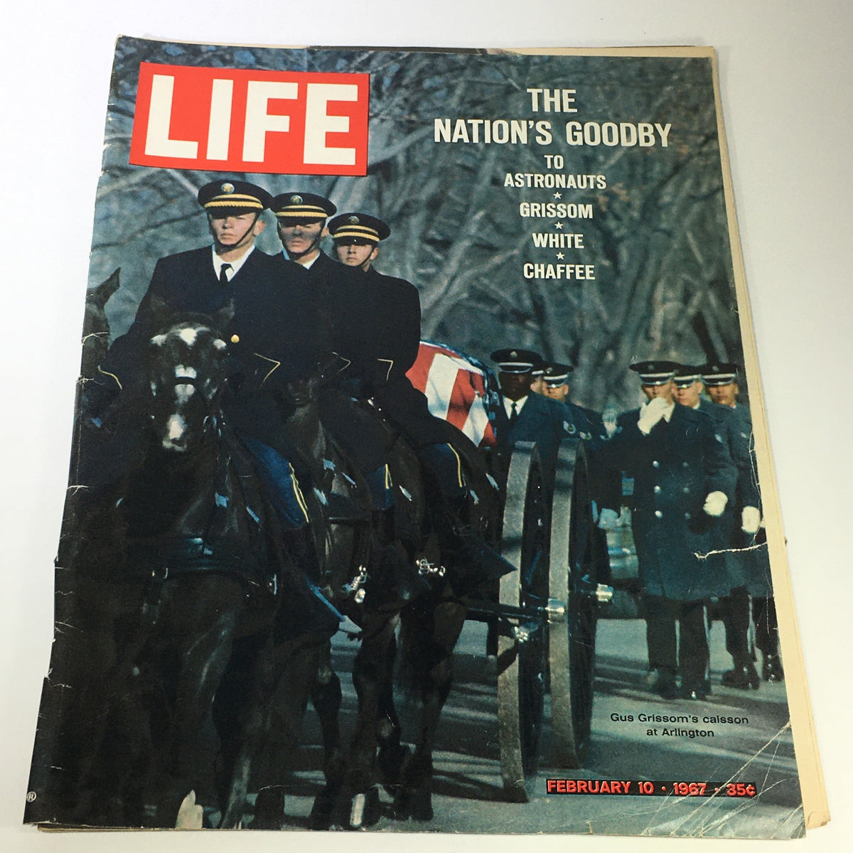 Cover of Life Magazine February 10, 1967, featuring a solemn procession for astronauts Gus Grissom, Edward White, and Roger B. Chaffee, showcasing the nation's farewell to these heroes.