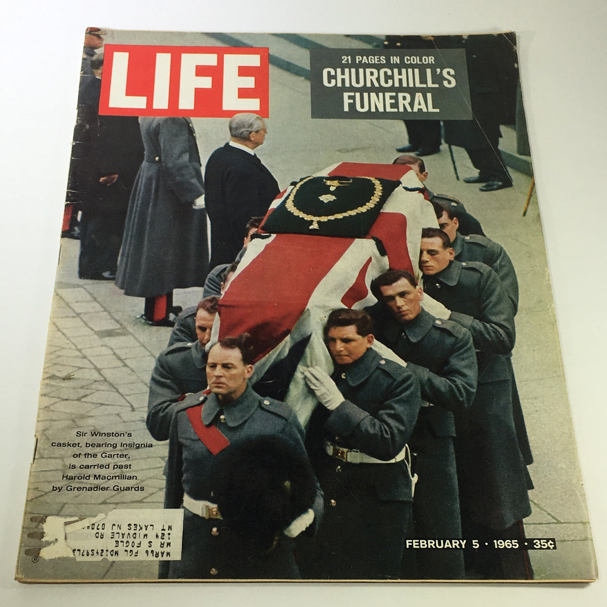 Cover of Life Magazine dated February 5, 1965, featuring a solemn image of Sir Winston Churchill's funeral procession, showcasing the historical significance of the event.