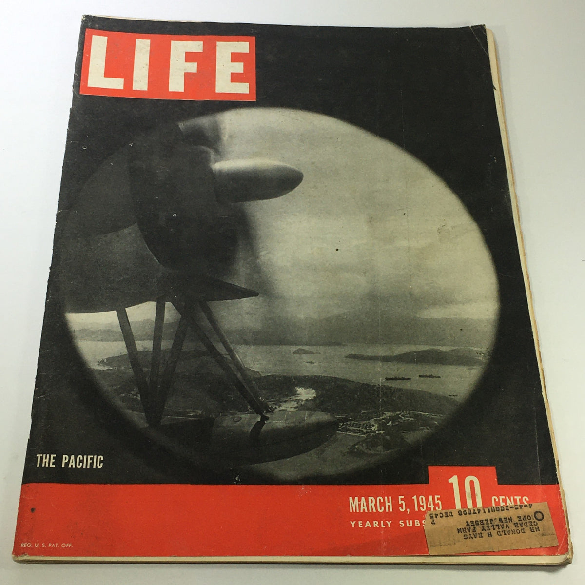 Cover of VTG Life Magazine March 5 1945 titled 'The Pacific Photographed', featuring a vintage airplane and a view of the Pacific landscape.