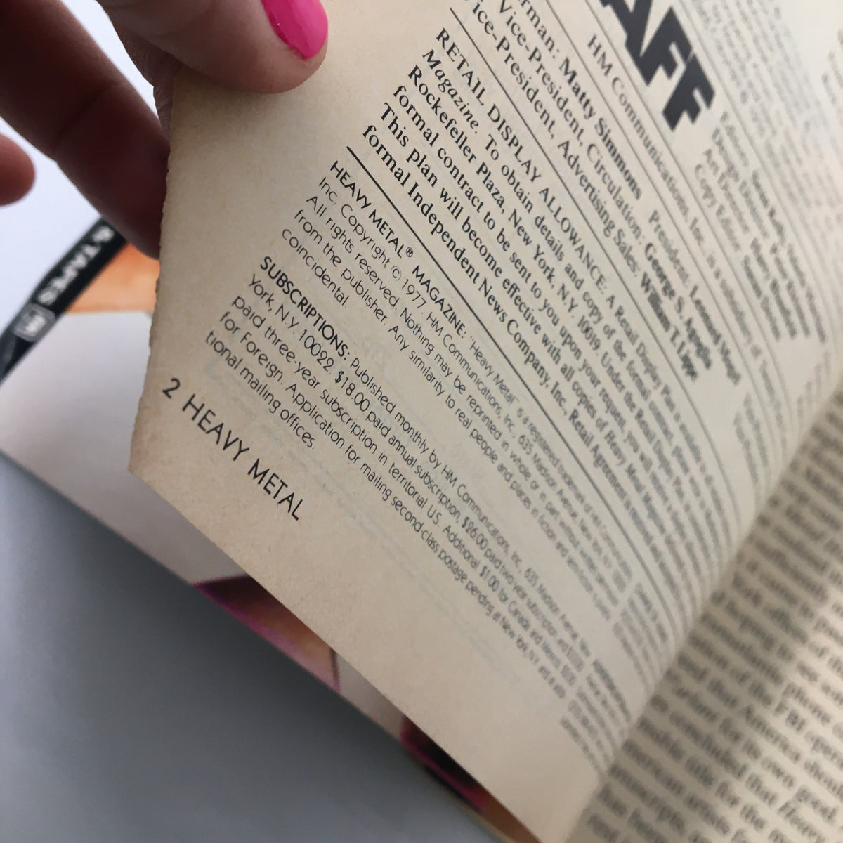 Close-up of the editorial staff section in VTG Heavy Metal Magazine April 1977, highlighting subscription details and magazine management.