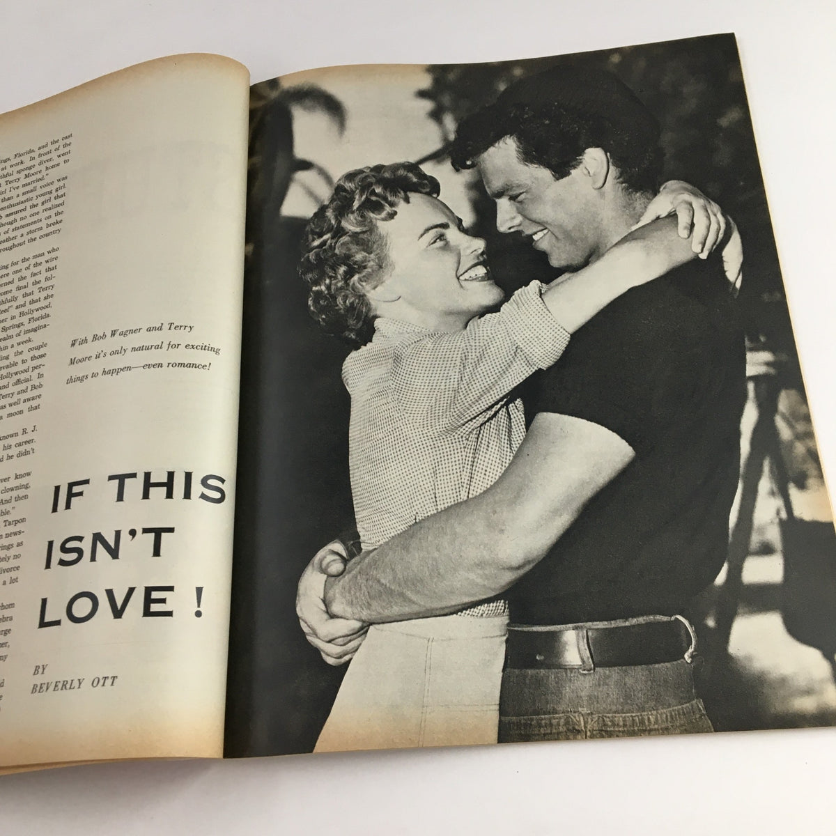 Photoplay Magazine July 1953 image showing a happy couple embracing, representing the romantic themes of the era in cinema.