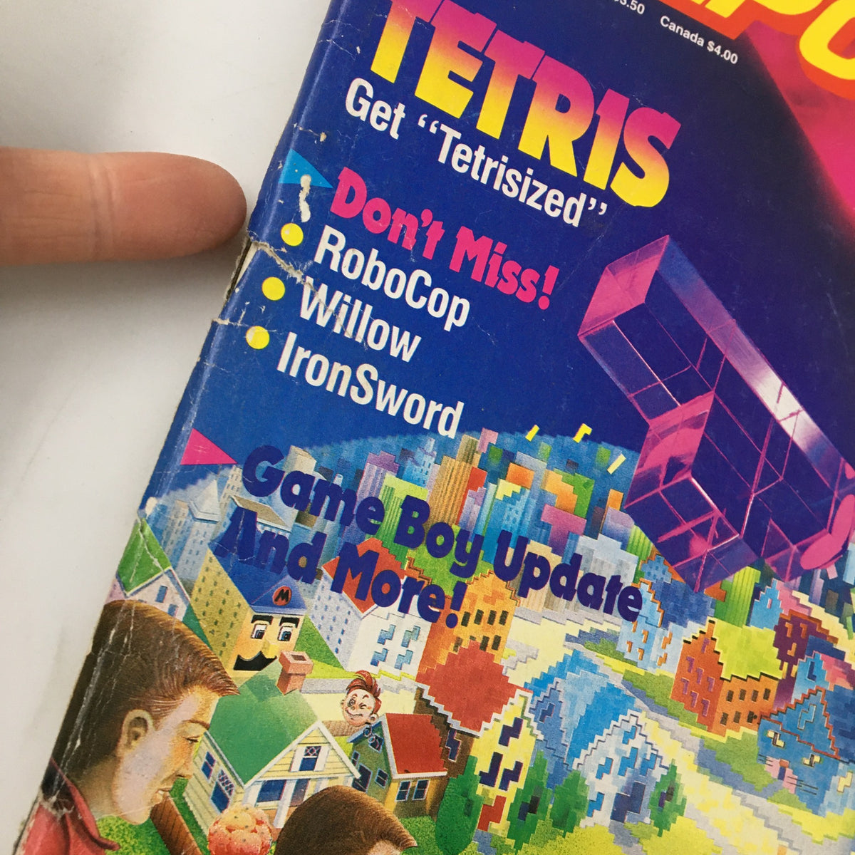 Close-up of the Nintendo Power Magazine November 1989 cover highlighting Tetris and other featured games like RoboCop, Willow, and IronSword.