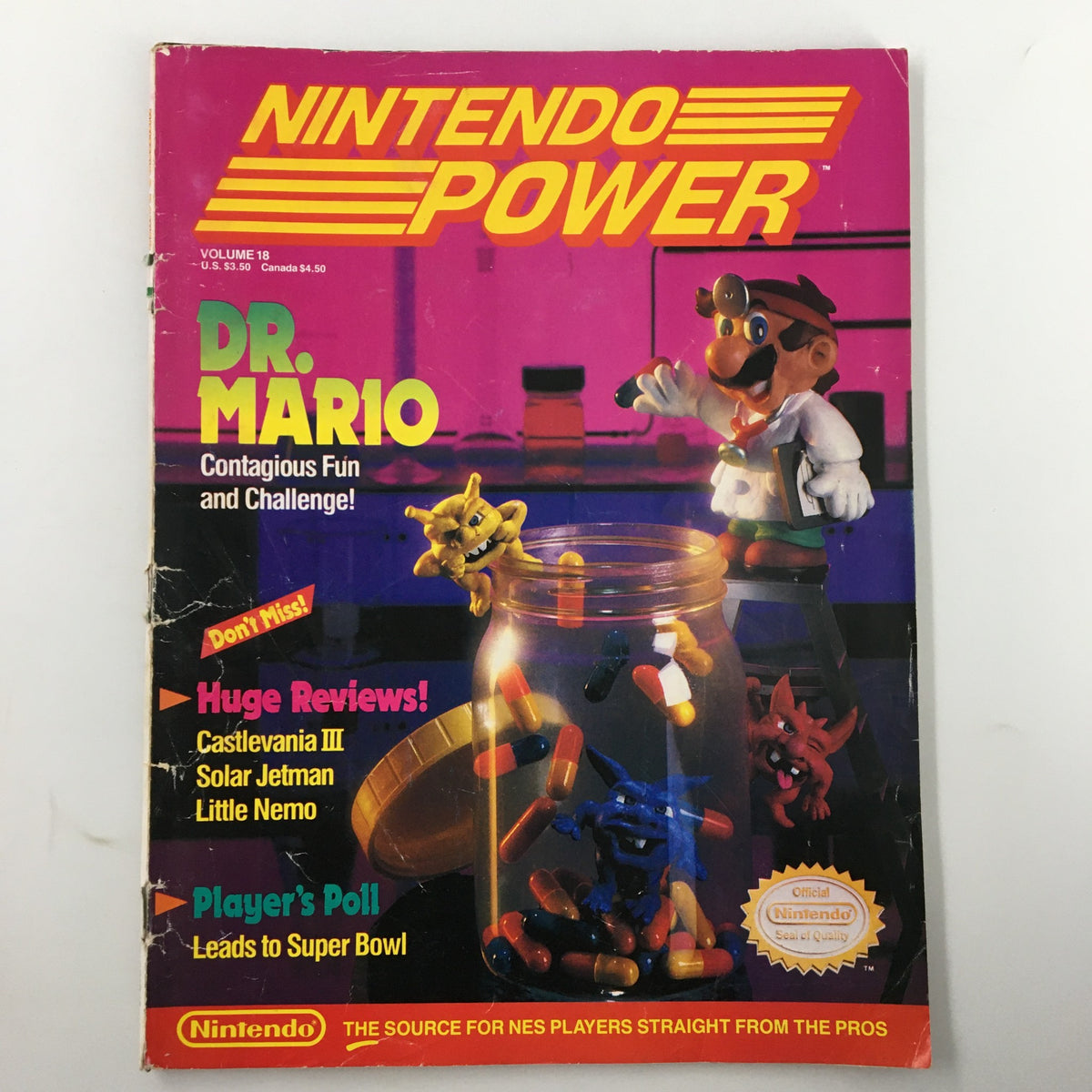 Cover of Nintendo Power Magazine November 1990 #18 featuring Dr. Mario, highlighting the theme 'Contagious Fun and Challenge!', with vibrant colors and game-related graphics.