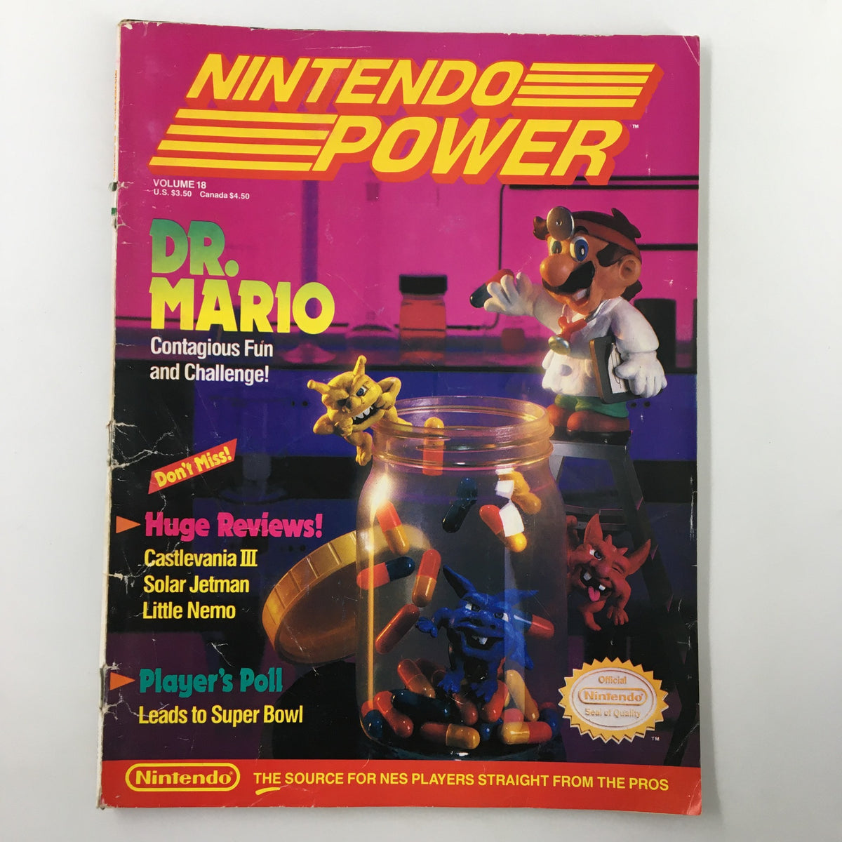 Alternative view of Nintendo Power Magazine November 1990 #18, showcasing the Dr. Mario cover art and details of featured game reviews.