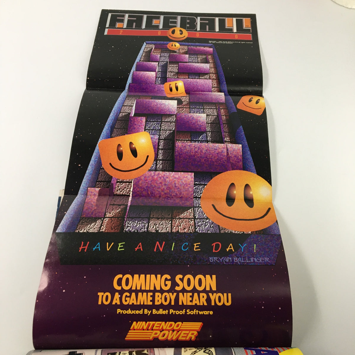 Poster included in Nintendo Power Magazine November 1991 #30 for the game Faceball 2000, featuring colorful graphics and promotional text.