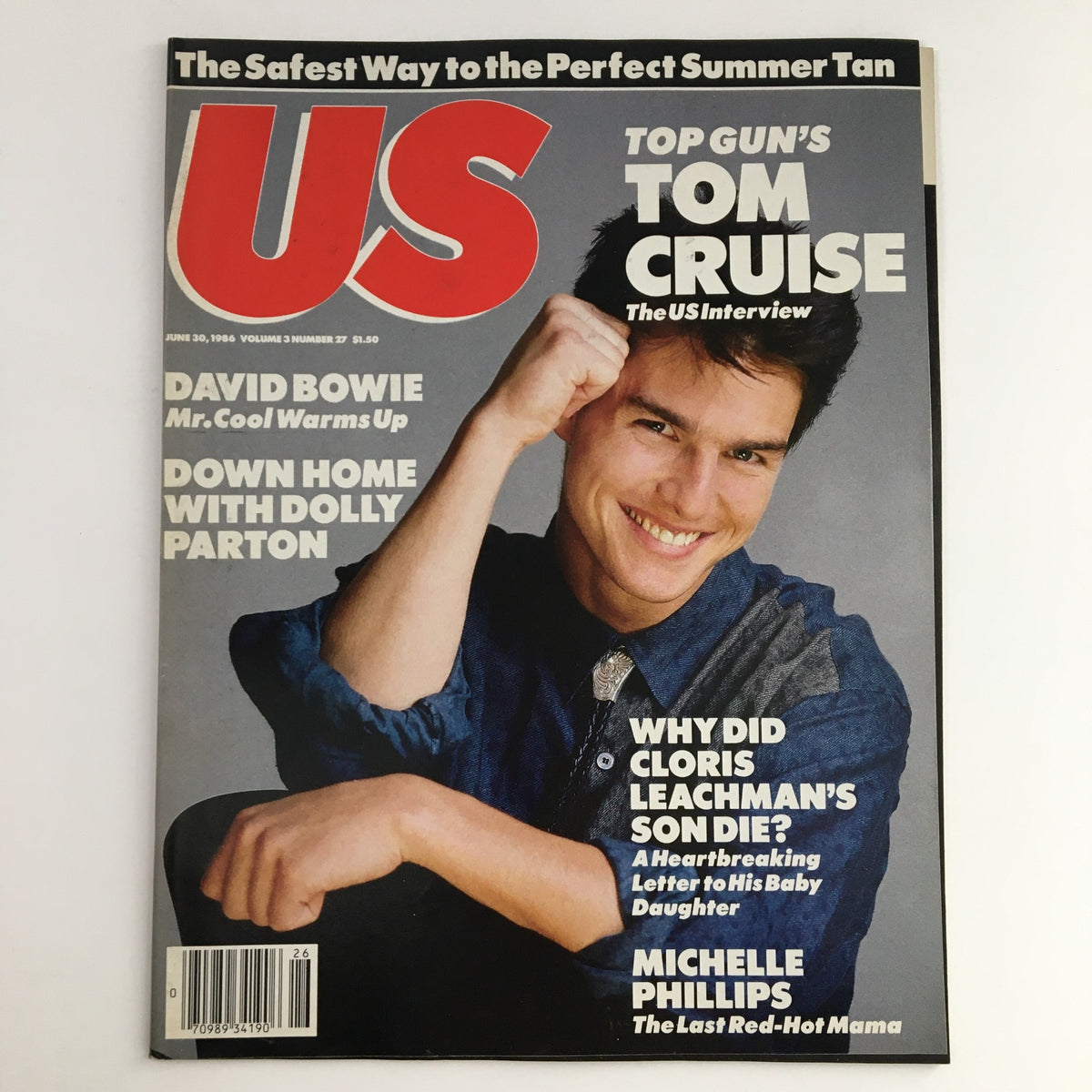 US Magazine cover from June 30, 1986 featuring Tom Cruise, David Bowie, and Dolly Parton. Highlights include 'Top Gun's Tom Cruise - The US Interview,' 'Mr. Cool Warms Up' with David Bowie, and 'Down Home with Dolly Parton.'