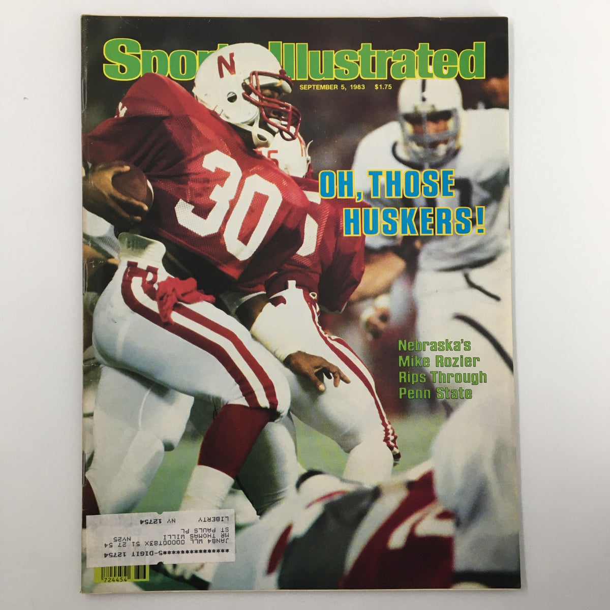Vintage Sports Illustrated Magazine from September 5, 1983 featuring Nebraska's Mike Rozler on the cover, showcasing college football history with the headline 'Oh, Those Huskers!' and depicting action on the field.