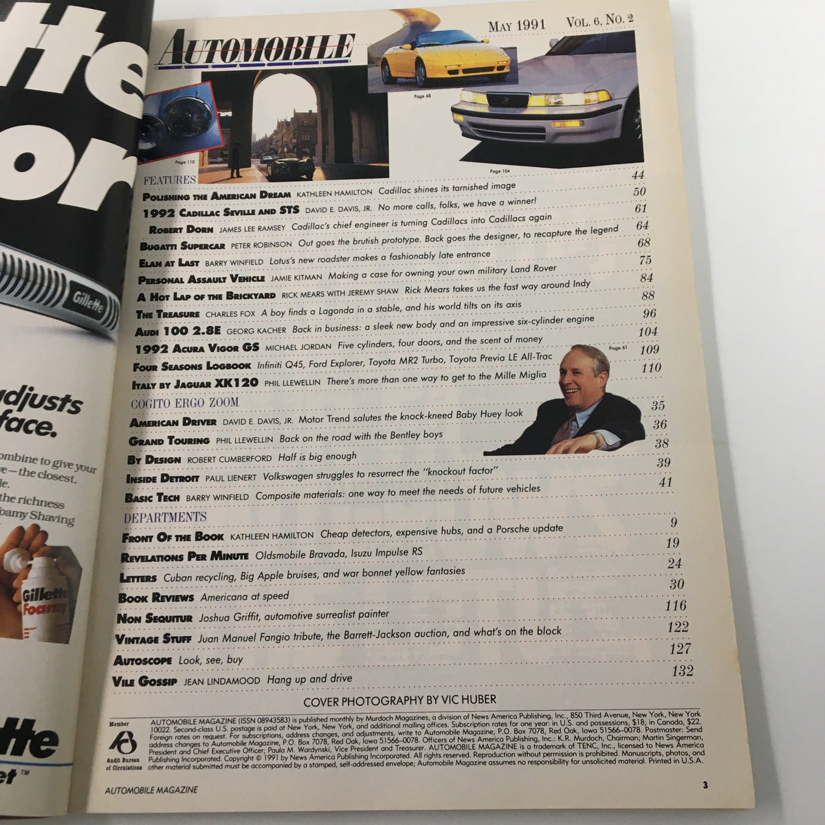 Inside the May 1991 issue of Automobile Magazine, featuring the table of contents with articles on Cadillac STS, Acura Vigor GS, and various automotive topics.